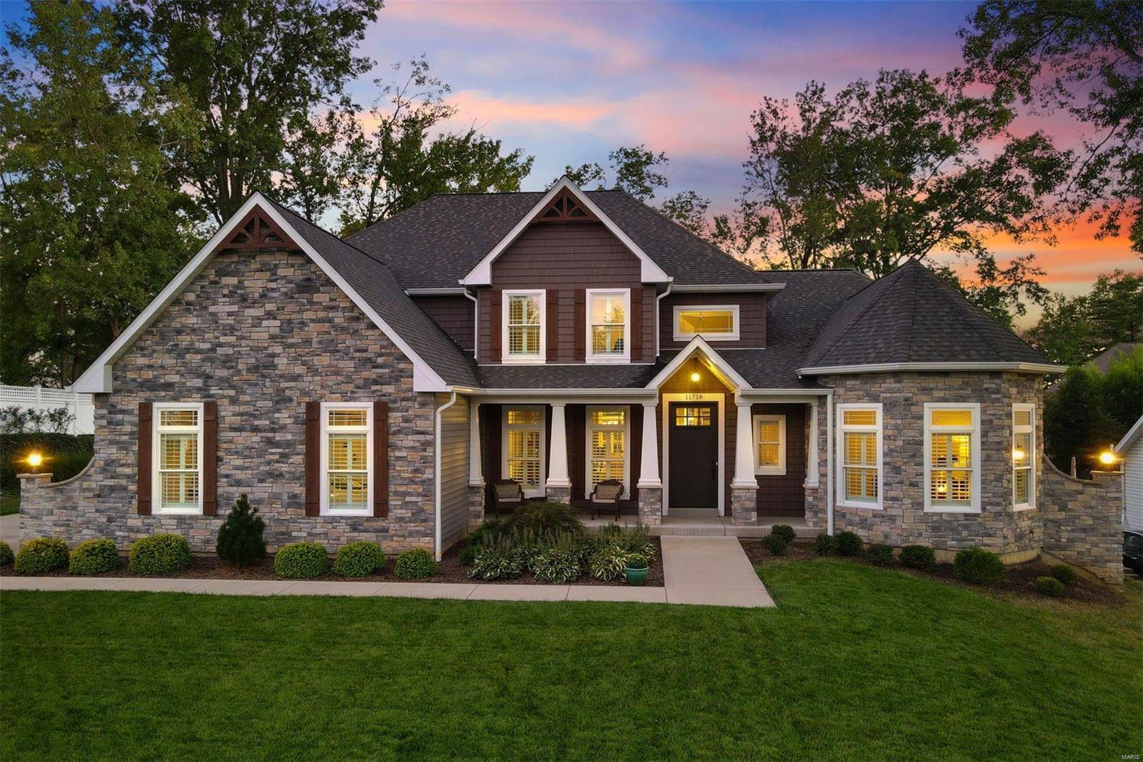 Built in 2017, this 1.5 story is pristine and lives like new. Main floor primary suite plus 3 addt'l bdrms and 2 full baths on upper w/ bonus room. No shortage of living space w/ a cozy hearth room, office, dining room and 2 story LR on the main. Grey and white kitchen with stainless appliances opens to separate casual dining and entertaining spaces, both in the HR and on the covered outdoor veranda overlooking level back yard. Full unfinished lower level with 9'+ pour is ready for the discerning buyer with lofty LL dreams. 3 car, side-entry garage adjacent the mudroom and laundry room for simple living. Additional Rooms: Mud Room