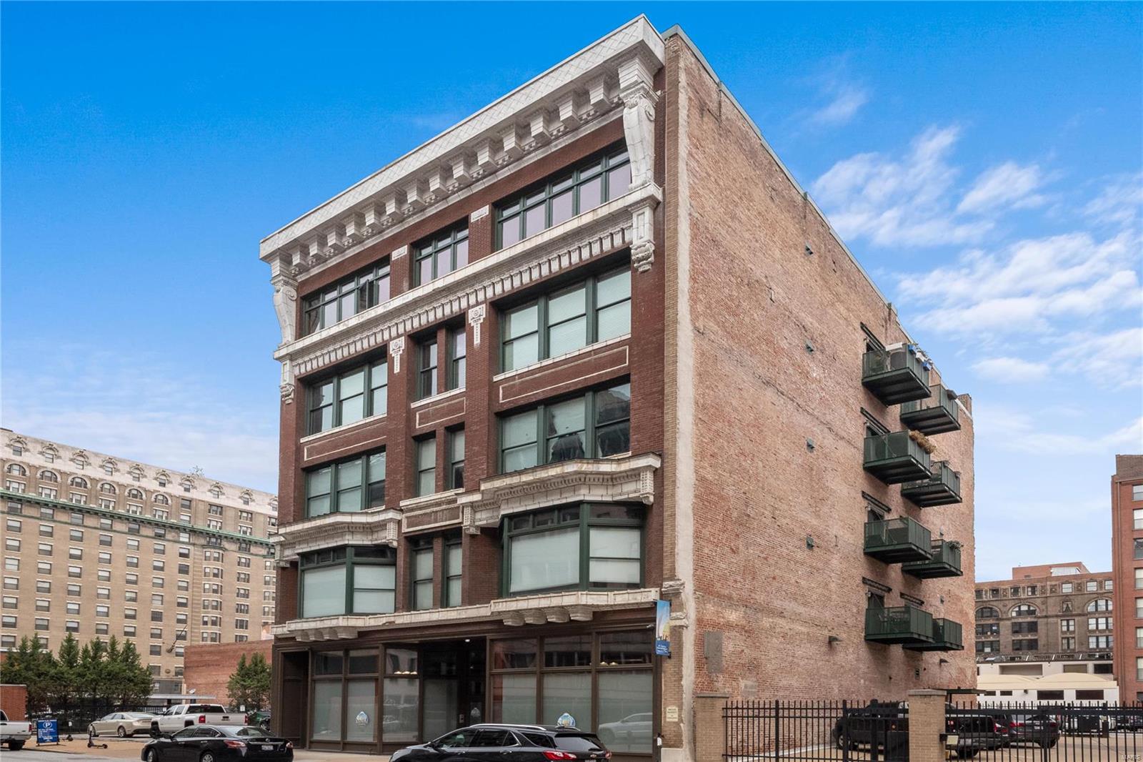Welcome to the Alexander Lofts, a boutique building in the heart of downtown! As the new owner, you will enjoy the privacy of the elevator opening directly into your unit. This open floor plan condo is a 2 bedroom/2 bath Penthouse loft style boasting over 2,400 sqft, 11' ceilings, maple wood flooring and exposed brick. The high-end kitchen features granite countertops, stainless steel appliances, custom cabinets, a walk-in pantry and an oversized center island that can comfortably seat up to 6 people! The master bedroom suite features a private balcony, a large walk in custom closet, double sink in master bathroom and a spacious walk-in shower. Other key features include 2 assigned garage spaces and an oversized storage unit on the first floor.  Do not miss this opportunity to see this great space! Location: Downtown, Upper Level