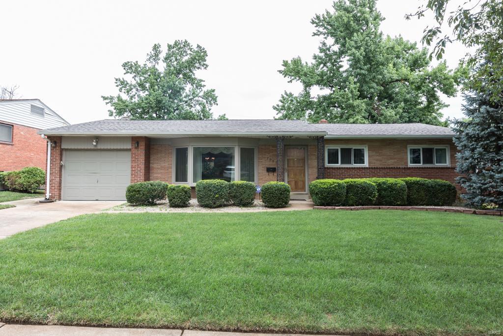 This brick ranch has been loved & looked after by the seller for 48 years. Homes that have been enjoyed by the same family for this length of time have a special energy. It is ready for you to make it your own. The living room with raised ceiling detail & a large bay window, overlooking the front yard, is warm  inviting. Direct access to the well sized dining room is perfect for entertaining. The main level den is cozy & perfect for informal living. The updated eat-in kitchen is the heart of the home & features granite counters, ample cabinetry, two ovens, two sinks, tile floor, a greenhouse window & an island where friends & family can gather. 3 Bedrooms & 2 full bathrooms, including a master bedroom-en-suite with good closet space. The 2-season room overlooks the level backyard & offers direct access to deck - perfect for indoor/outdoor entertaining & enjoyment. 1 Car attached garage and full basement. Easy access to shopping, dining, Washington University, Forest Park & I-170/64.