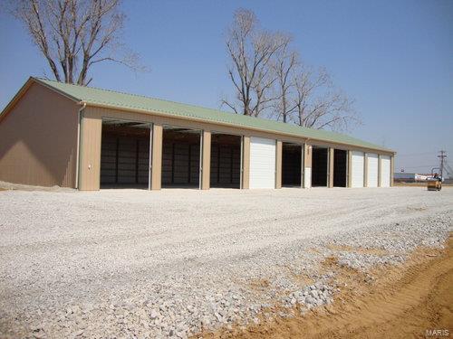 Commercial storage facility on 4 acres. Currently being used as RV and boat storage. Property has 3 large storage buildings, each with 10 overhead doors. Equipped with black water dump station and fresh water wash station. Location: Other