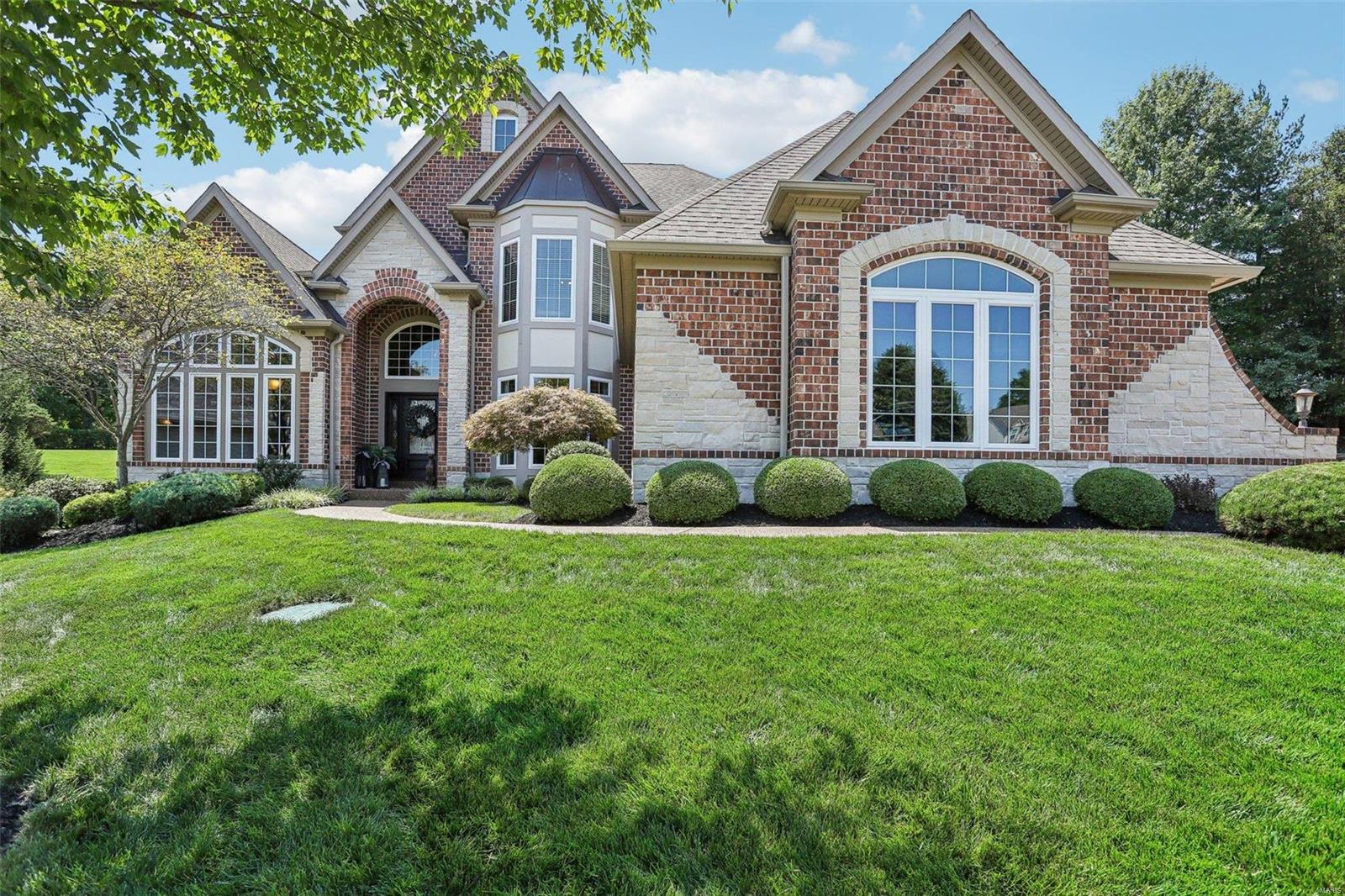 Discover this stunning 1.5-story home with 5 bedrooms and 5 bathrooms, offering over 5,158 sq ft of luxurious living space. Every corner of this home is thoughtfully updated. The main floor features a spacious master suite and gleaming hardwood floors in the entryway and kitchen. The finished basement is perfect for entertaining, boasting a full kitchen bar area, a walkout, an additional bedroom, and a full bath. Upstairs, find three generously sized bedrooms, two full bathrooms, and a versatile lofted area ideal for a second family room or play space. Located in a desirable cul-de-sac, this home includes a large 3-car garage and a charming patio off the kitchen. The kitchen itself is a chef’s delight, with granite countertops, an island, a breakfast bar, and stainless steel appliances. Adjacent is a cozy hearth room with a gas fireplace, perfect for relaxation. Don’t miss your chance to see this exceptional home—it's truly a must-see! Open this Sunday from 1-3 PM. Additional Rooms: Mud Room