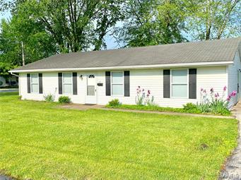 Three bedroom home on a corner lot, with over 1500 square feet of living space. Huge living room and kitchen area for entertaining. Outbuilding goes with the home as well.