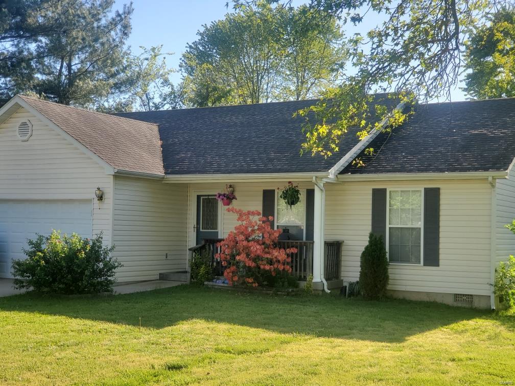 Beautiful 3-bedroom, 2 bath home settled in heart of charming, Cuba, MO.  This home has vaulted ceiling in the kitchen and living room with recently constructed hearth wall and electric fireplace.  The kitchen and laundry room are also accessible from the attached 2 car garage.  Dining room has door which opens to back deck and pool. Backyard has wooden privacy fence with gate to allow for easy access. Master bedroom and bedrooms are on same end of house for safety and security. This is a great home in a nice neighborhood. Bonus, you can beat the summer heat with your own private pool.  Close to Cuba schools, Hood Park, shopping, area wineries and rivers.