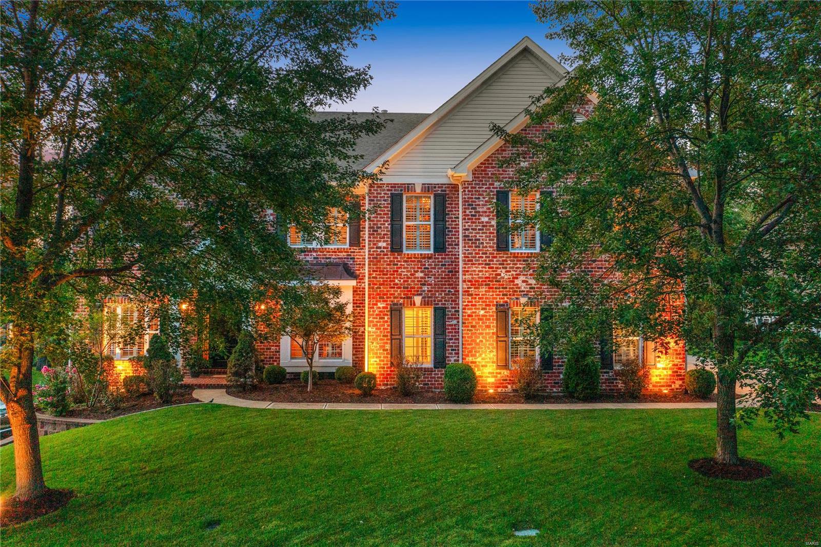 Spectacular Harwood Hills home with over 6300 sq/ft of finished space & over 4800 sq/ft of above grade living space, situated on a gorgeous lot with custom stone patio & outdoor fireplace! This beautiful home boasts numerous amenities such as a gourmet kitchen with 42 inch Alder wood cabinetry, Dacor appliances, granite counters & butlers pantry all overlooking the spacious hearth room & fireplace. Gleaming hardwood floors throughout the main floor with 10ft ceilings, office/den, living room, family room & separate dining. The lavish master bedroom includes an office/sitting room and a fabulous designer master walk in closet with custom cabinetry. The 3 additional bedrooms offer a private bath & Jack/Jill bath. Professionally finished lower level includes a bar, rec room, private office & ½ bath. Additional amenities include 2 fireplaces, built in bookcases, crown moldings, plantation shutters throughout, oversized 3 car side entry garage, alarm & sprinkler system. Culdesac location!