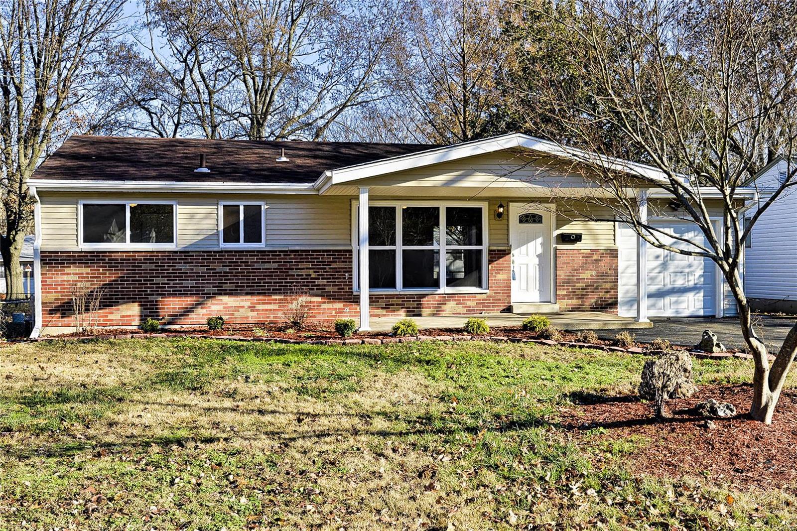 Brand new renovated property ready for New Owners in the New Year! Your kitchen has new stainless appliances, cabinets, flooring, countertops & backsplash.  Refinished hardwood through entire main level.  All new windows & doors, new electric panel, garage door & opener.  Even the outside of this home has been restyled with newer architectural shingle roof, siding, driveway, landscape & some exterior lighting.  A large patio overlooks your fully fenced flat yard w/ 10x10 utility shed on site.  Updated bath, HVAC system, plumbing stacks & water heater are also very young systems.  You can expect a very low level of maintenance with this one. (BACK ON THE MARKET DUE TO BUYER FINANCING- THIS IS SO READY TO GO- ALL INSPECTIONS COMPLETE).