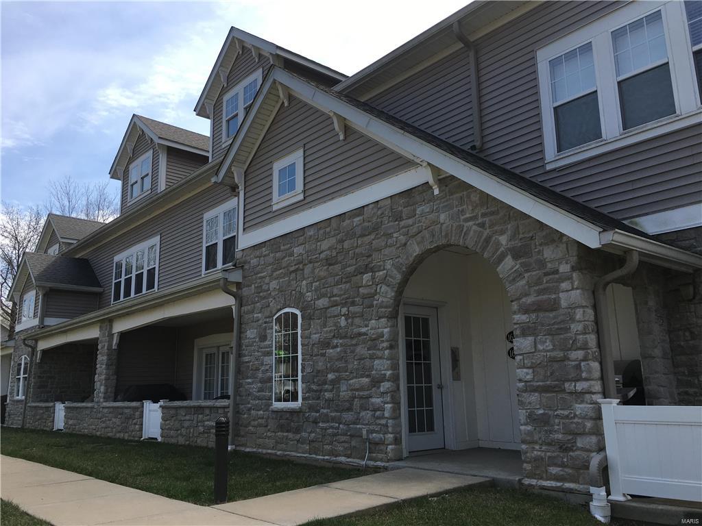 Unique  Floor Plan in Outstanding Condition in Convenient Area of Chesterfield. A Beautiful View from Every Window. This Condo Features Two Master Suites; One on First Floor and One on the Second. Two Appealing Living Areas: One on each Floor. NEWER HARDWOOD on Entire First Floor Excluding Master, Current Black Appliances - Refrigerator, Oven, Microwave & Dishwasher, Washer & Dryer, 42 Inch Cabinets. Vaulted Ceilings. Loft. Two Car Garage with Large Storage Area. Two and One Half Baths. Lots of Closets-Walk-In Closets in Both Suites. Newer Air Conditioning. Washer & Dryer Stay! VERY NICE ENTERTAINMENT CENTER WITH TV STAYS. Deck off First Floor Suite. Lake, Swimming Pool, Walking Trail, Exercise Area. Walking Distance to Chesterfield Mall. Location: End Unit