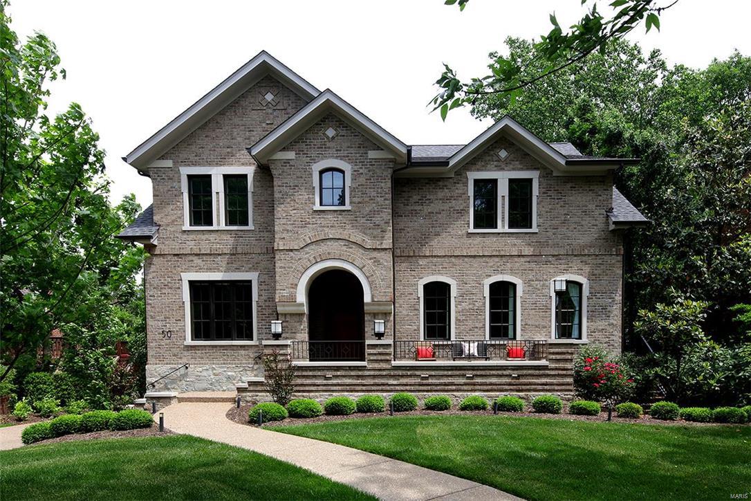 Welcome to this remarkable home with exceptional architectural details throughout.10 ft ceilings, crown molding, oak floors, glass panel staircase and custom wooden doors. Gracious entry offers an expansive view of great room with fireplace & quartz surround. Lg dining room with arched windows, tray ceiling and wainscoting. Study has coffered ceiling with built-in library and tall glass doors. Hallway powder room is impeccably designed. Kitchen is high end with Wolff/ Subzero/ Asko appliances quartz counters, walk-in pantry, 54" Gegg cabinetry &  butler's pantry with dishwasher and beverage refrigerator. Cheerful sunroom off kitchen with custom glass sliding doors and fireplace leads to lg deck. 2nd floor has luxury master suite with 2 lg walk-in closets, BainUltra bath and lg sitting room with fireplace. Remaining 3 bedrooms all have ensuite baths. LL has 5th bedroom with bath, media area and full kitchen that opens to a patio. Attention to detail in this newer home is a rare find.