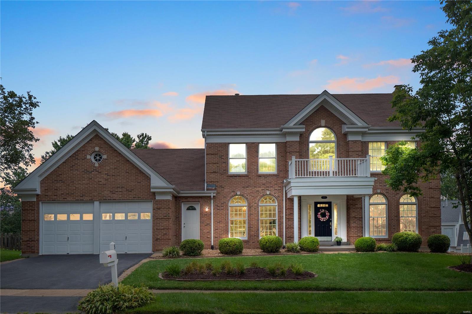 Welcome to this classic 2-story home w/all brick façade & covered porch entrance, nestled in a prime location just off Manchester Rd & in the award-winning Parkway SD! Step into the grand 2-story foyer w/gleaming hardwd flooring & flanked by a sitting rm & formal dining rm w/floor to ceiling palatial windows! Back of the house boasts a family rm w/wall width bay window, brick front wood-burning FP flanked by 2 built-in bookcases, hardwood flooring throughout & crown molding. Large chef’s kitchen w/vaulted ceiling, custom cabinetry, center island w/cooktop & breakfast bar, double oven, plenty of storage & countertop space! Breakfast rm w/bay window & direct access to the newly renovated deck! Laundry & powder rm complete the main level. Upstairs features a large master suite w/vaulted ceiling, dual-sink vanity, corner soaking tub & separate shower. 3 additional BD & 2nd full BA. Finished LL offers a 5th BD w/full BA, wet bar & rec rm w/walk out onto the patio & fully fenced-in backyard.