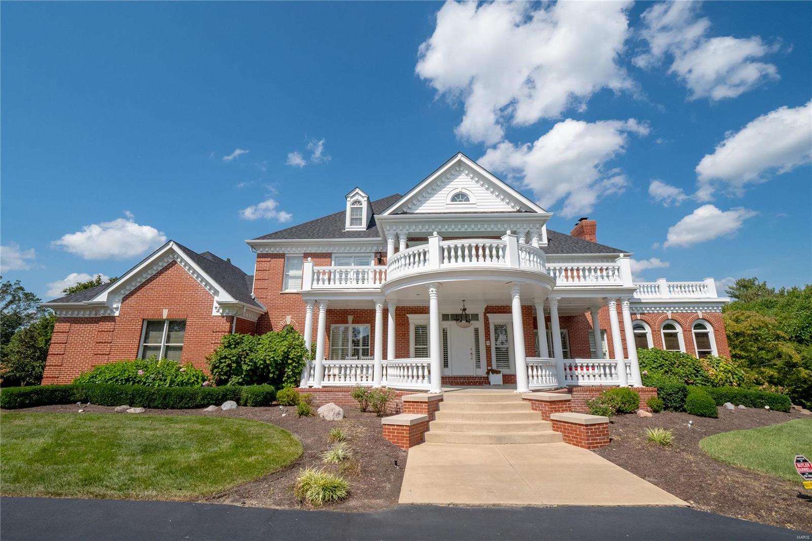 Welcome to one of the finest and most spacious estate’s in Town & Country! This spectacular 5b/4.5b features 6,000+ sq ft of finished living space, a 3 car garage, and is poised on 1.5 beautiful acres. Grand entry foyer is flanked by a chic formal LR with bar and bright FR with walls of windows and a pass-thru gas fireplace. Adjoining the FR is a formal study with rich woodwork and built-ins. Large, thoughtfully designed eat-in kitchen boasts custom cabinetry, high-end appliances, gorgeous countertops and leads to a formal DR with fireplace. Watch beautiful western sunsets on the covered back deck overlooking the grounds with a pool, recessed trampoline, and tennis court. Vaulted primary suite with outdoor terrace, multiple closets and private bath. 3 more bedrooms (1 ensuite) and 2 baths complete the UL. Finished, walk-out LL features family/rec areas, game room, bedroom, bath, fitness room and theatre. Plantation shutters, ornate moldings, wood floors, this home has it all!