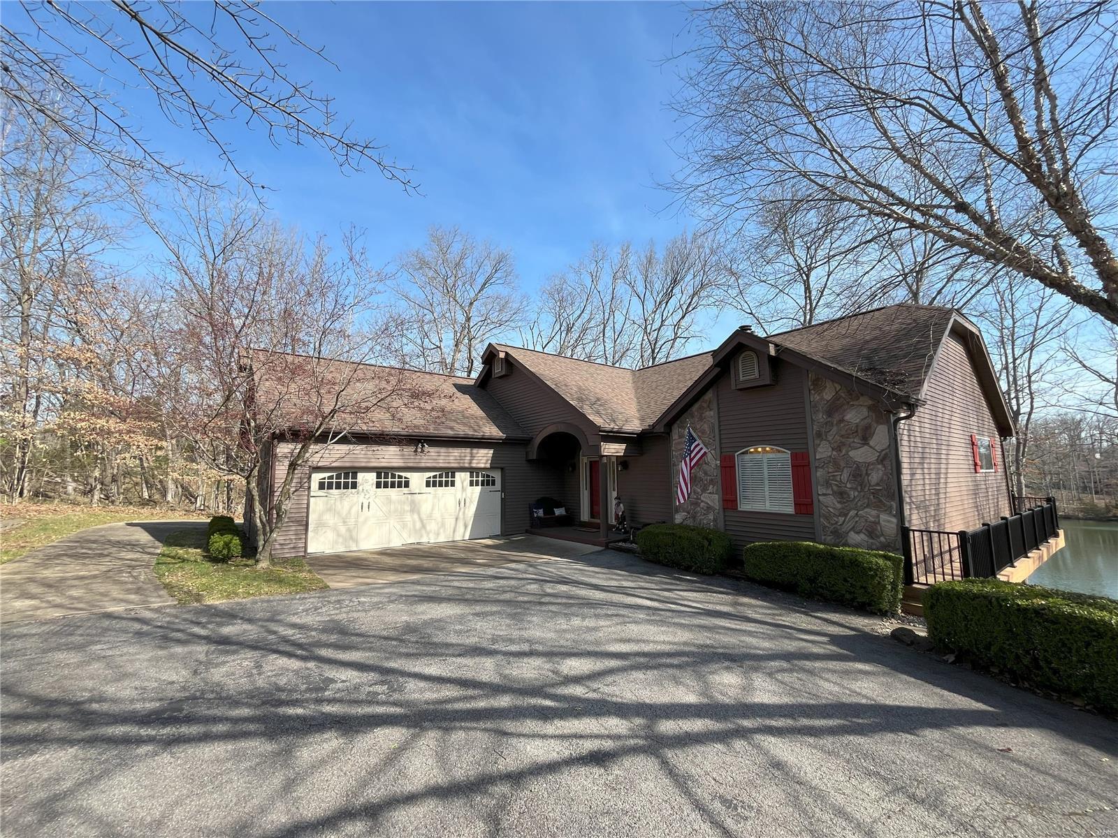 Fantastic lake front home in sought after Innsbrook Resort. This gorgeous property sits on the shores of Whippoorwill Lake. With deep and clear water you'll be sure to enjoy endless hours swimming, paddle boarding, and fishing. Stepping inside a vaulted wall of windows greets you. Lake views and stately trees immediately catch the eye. Wander into the updated kitchen with large island and attached main floor laundry. Entertain around the attractive gas fireplace. Overflow into the sunroom. The updated deck features composite decking, metal railing, and built in down lighting. Retire to the spacious master suite. The finished LL features a massive bar area and rec room. Three beds plus an additional bath allow ample guest sleeping. The huge screened porch leads to the private lakeside dock and beach. This wonderful home will make the perfect residence or second home! Additional Rooms: Sun Room