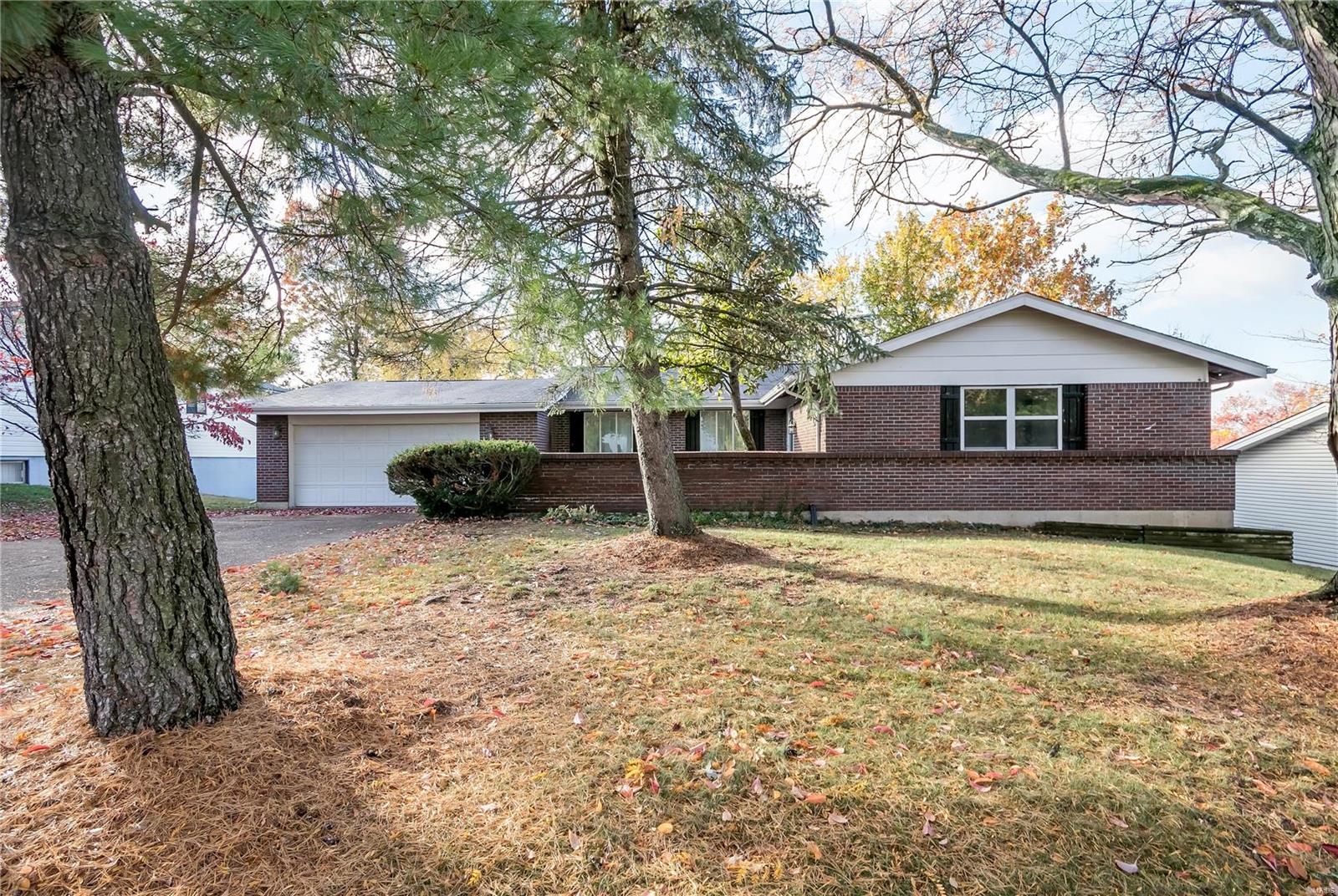 Tremendous value for well-maintained move-in ready rental home, high-rated Parkway North Schools! Exceptional convenient West County location, wonderful upgrades, extremely clean, boasts oversized 2 car garage w/updated insulated door, 3 bedrooms, 2 full baths. Absolutely gorgeous wood floors, neutral paint, white panel drs/brushed nickel hardware, mirrored closet drs. New roof '19, updated electric panel, A/C, plumbing stack, front dr, light fixtures, some thermal windows. Master suite w/double closets & French doors to private bath. Impressive bath updates, striking custom tile showers, generous sized vanities, ceramic tile flr. Wood kitchen cabinets, newer appliances & vinyl floor, ceramic tile backsplash, pantry, lazy Susan, adjoining breakfast rm w/walk out to nice wood deck overlooks back yard w/patio below. Expansive storage space in walk-out lower level. Great history, good bones, home owned by 1 family for 50+ years! Refrigerator Incl, Available Immediately, 1 Year Min. Lease.