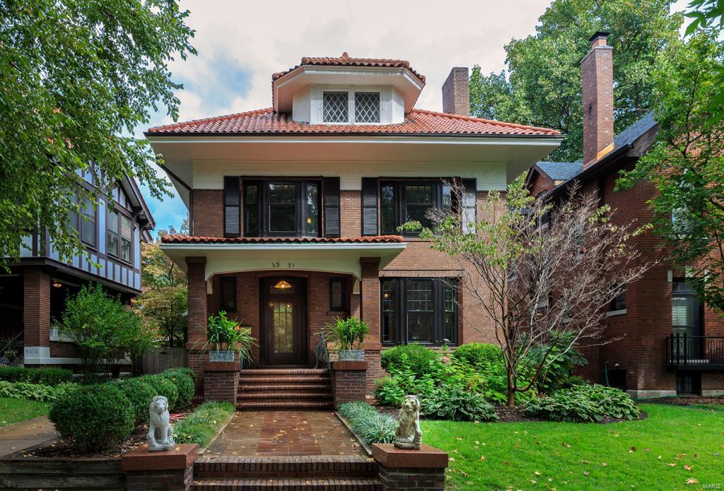 NO SIGN. This Parkview home is an Arts and Crafts gem designed in 1909 by famous World's Fair architect L. Baylor Pendleton. Architectural features include Missouri red granite on the porch, large entry hall, main staircase with stained glass bay window, gracious living room, huge dining room (with two sets of French doors that open to wrap-around brick terrace with steps to back yard), original built-in cabinetry, pocket doors, three-quarter paneling, beam ceiling, and gorgeous wood floors throughout the first and second floor. 2015 Kitchen renovation with quartz counter top, stainless appliances, Shaker style white cabinetry. Second floor has four large bedrooms and full bath (renovated 2014). Back staircase leads to third floor with a huge bedroom, a smaller bedroom, a bonus room, full bath and walk-in linen closet with original built-in cabinets. 2 car garage. Present owner is only the 4th owner and has meticulously restored and maintained the historic character of this home.