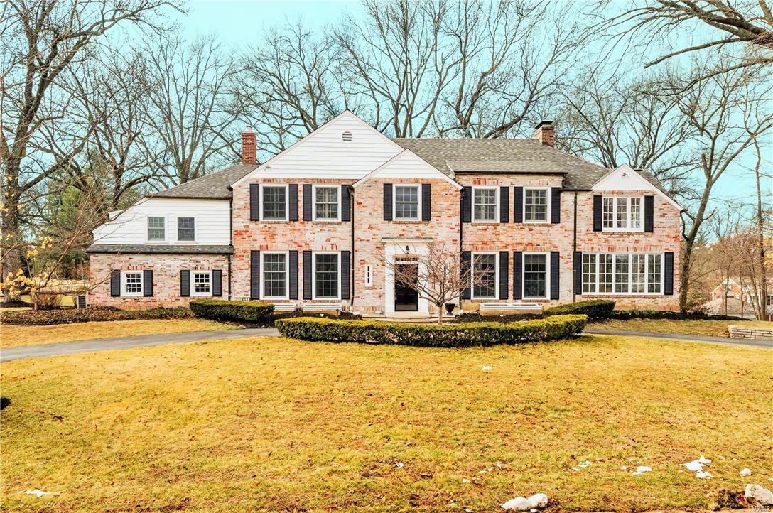 Classic, updated & upgraded 4bd, 4.5ba 2.5 story brick charmer in Ladue's prestigious Briarcliff subdivision. Exquisite whole house makeover is stylish, classic, & professionally completed in appropriate designer appointed trends. Grand entry, formal dining, spacious living, 3 fireplaces, in-laws suite, updated kitchen/ basement/ baths, fin LL, sunlit Family Rm/office; Kitchen w/ custom cabinets, new granite/ tile/ stainless appliances; Incredible yard & paver patio open to home via numerous french doors. Master Suite impresses with sitting room & nicely appointed bath featuring dual vanities+ makeup vanity & dual closets. Finished LL has Rec Rm, built-in bookcases, 3rd fireplace, full bath, & storage. Exterior patio, custom lighting, landscaped grounds, copper gutters, circle drive+ rear entry garage, & great appeal. New carpet, gleaming wood, period appropriate designer finishes; truly turn key with both desired & needed updates completed yet remaining architecturally spectacular.