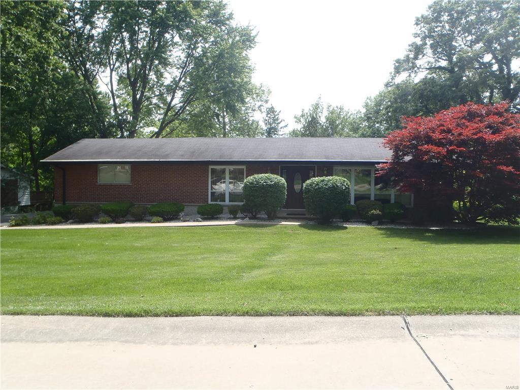 Spacious brick and vinyl ranch. This lovingly cared for home is waiting for its new family. You will appreciate the wood floors in the living and dining room and kitchen. Eat in kitchen. Many hours will be enjoyed in the family room. The lower level has a rec. room with a dry bar and game room, cedar closet and extra storage. The men will enjoy the 3 car garage. Quiet cul-de-sac. Furnace and  a/c were purchased 7/2014, carpet in master bedroom May, 2016. All windows were replaced but the master bedroom and kitchen.  Seller had the Unincorporated inspection. Professional landscaped yard on a corner lot.  
 Washer, dryer & refrigerator stay but "as is." Must see!