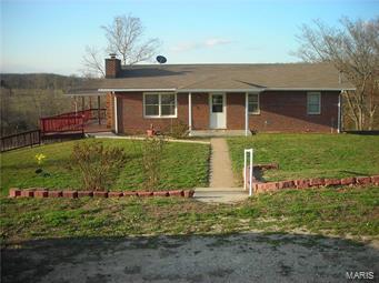 Property for sale will have two parcel ID's 06-9.0-32-000-00-002.00 contains 27 acres and parcel ID 06-9.00-32-000-00-0012.00 contains 2 acres, house and barn. The parcels will not be sold separately.  Property is in a great location right off of HWY 42 with private drive to home. Would make great cattle farm!
