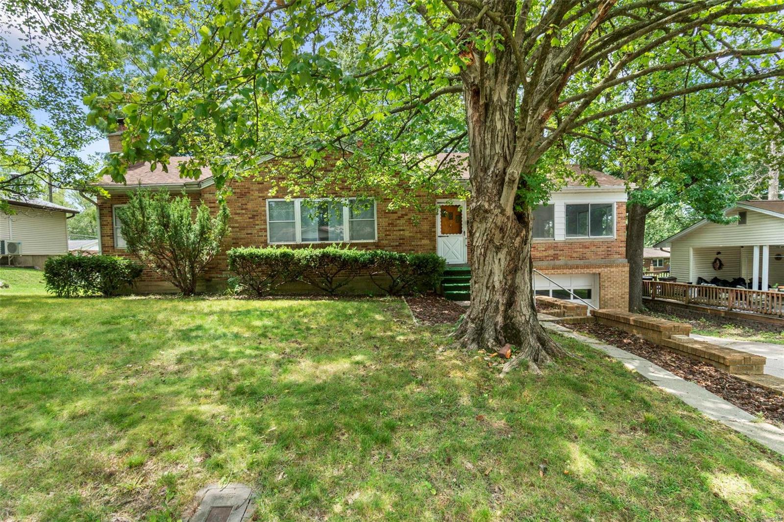 2551 Ranchito is an amazing home with great space, open living, and great features. This home has a nice deck with an amazing yard that compliment the outside space! Hardwood floors, partially finished basement, fireplace, and workspace in the basement! Come take a look at this home today!