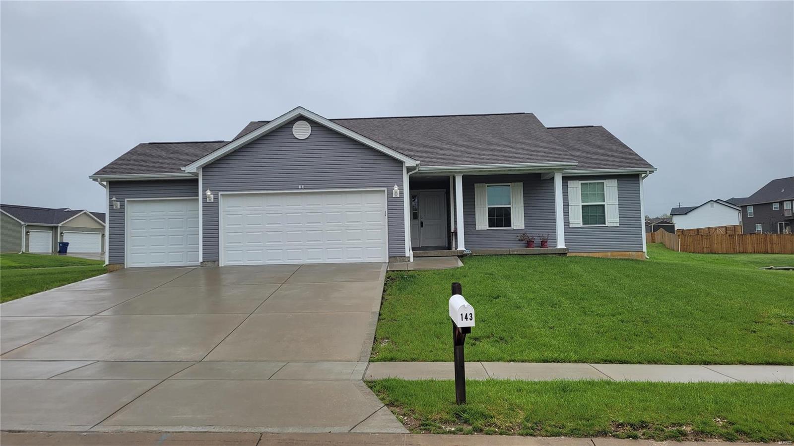 WOW-- this is an amazing Ranch Style home with an open floor plan with 3 bedrooms, 2 bath, 1214 sqft. Walk in the foyer to be greeted with vaulted ceilings, recessed lighting, stainless steel appliances, Espresso cabinets, ceiling fans in the great room and master, main floor laundry, brushed nickel hardware, upgraded 2 panel doors, and upgraded vinyl flooring throughout. The Master includes walk in shower and walk in closet. Craftsman style exterior with covered front porch, 3 Car Garage and it sits on a level lot. The basement includes poured concrete, rough- in bath, egress window, and sump pump and pit.