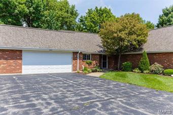 This Spacious One level Home in a (Planned Unit Development) is Ready for its New Owner. NO MORE STEPS Everything is on the MAIN LEVEL. Step Inside to Find a Cozy Gas Fireplace Family Room that opens to the Dining Room. The Updated Kitchen Features Built In Bookshelves, Additional Storage Cabinets & Planning Desk. Beautiful Wood Floors in the Kitchen. Oak Cabinets, Ceramic Tile Backsplash, Smooth Top Stove, Master Suite w/Full Bath. Cozy Patio with Brick Paver Stone Border. 2 Car Garage w/Service Door, Clubhouse, Pool, No more Shoveling Snow and No more Mowing Grass, St Peters takes care of the streets. Architectural Roof w/Ridge Vent. Centricom System. This Home has been Nicely Maintained by its Current Owner and Should be Placed on your MOST WANTED List. Anything else is a compromise! Location: Interior Unit