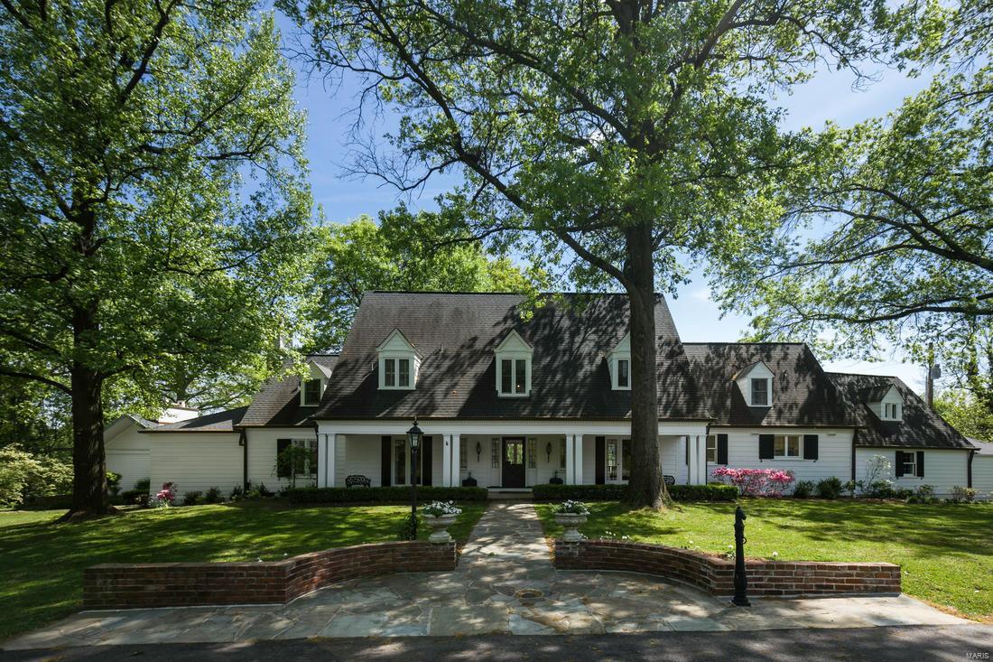 A Maritz and Young built home on a 2+ acre estate, right in the heart of Ladue. 22 Clermont  retains significant original architecture with updated mechanical infrastructure in near perfect condition. A spacious floor plan with many windows, tall ceilings and a terrific chef's kitchen with comfortable breakfast room. Additional private guest quarters and pool house, with exceptional views and spectacular space for entertaining. A 3 car garage, large patio and expansive  back yard with large fish pond complete the total living experience. Agent Owned  (Tennis Court has recently been removed)