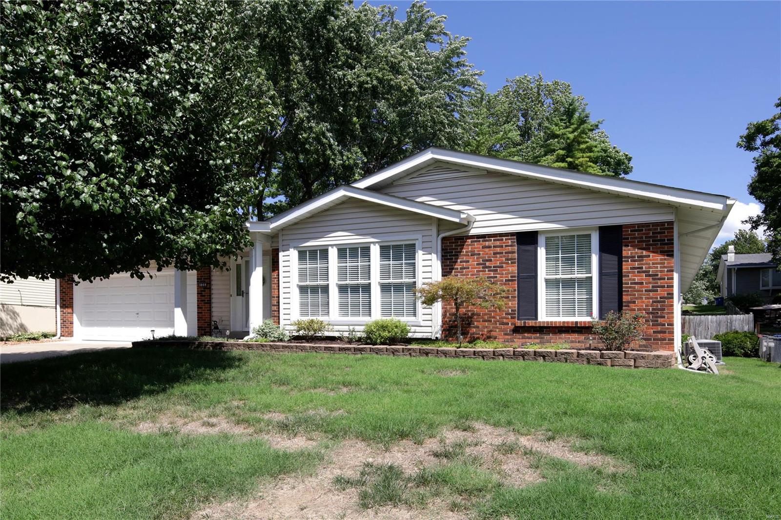 PRIDE  of ownership in this well maintained ranch.  GREAT CURB appeal as you pull up with it's covered front porch and NEWER driveway.  Formal living and dining room.  Spacious eat-in kitchen with pantry and tile back splash white cabinets with newer cabinet hardware.  UPDATED light fixtures.  ROOF is 3 years old.  WATER HEATER new 2015.  FURNACE AND A/C new in 2014.  Double hung windows.  Upgraded flooring.  New shower master bath.  Driveway and garage floor approx. 5 years old.  FENCED yard with PATIO and some mature trees.  ACCESS door to the yard from the garage. There is gas line right outside the house, seller just preferred electric.  Seller has paid for a maintenance agreement to service furnace and air conditioner in fall and spring. Paid through 2018.   Very nice subdivision and great location.