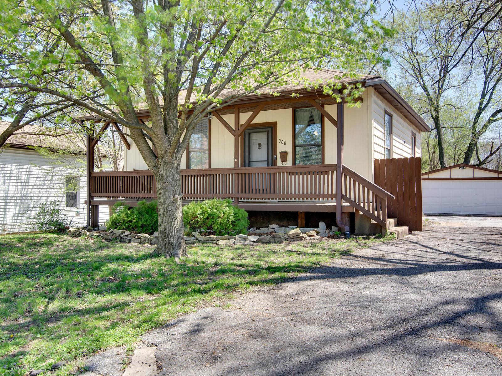 This charming home is located in the quaint neighborhood of Longwood Park. This house boasts tons of storage! The closets in every room are large.  There's new vinyl flooring throughout living room, hallway, and kitchen. New carpeting in both bedrooms. Fresh paint throughout the home and on the back deck. The driveway extends to the spacious two-car detached garage with a shed behind for extra storage. The basement is half finished with a new electrical panel, laundry, and ample space for more storage. Close to tons of convenient shopping, delicious food, highway access, and parks!