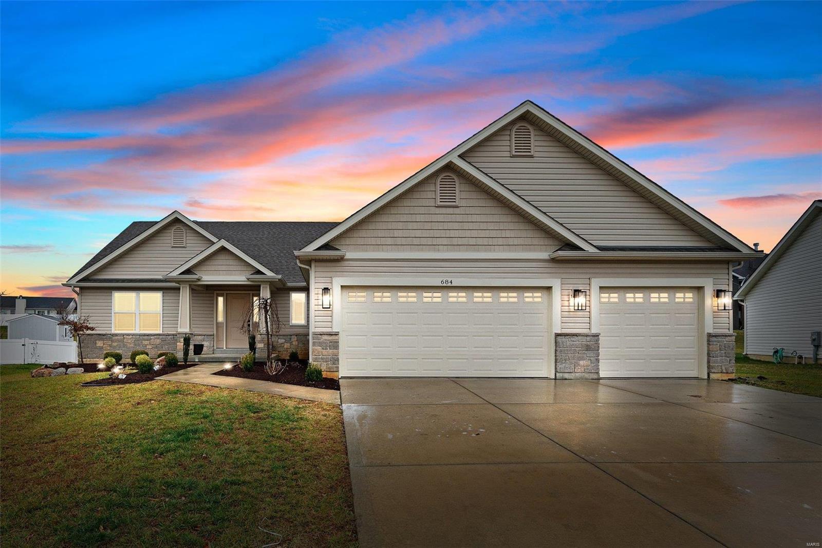 This Zykan & Sons Custom built 4 year old home Split Bedroom Ranch, The Sherwood, is decked out! How can you improve on an already amazing home...finish the basement! Located in Timber Trace Subdivision with easy access to Hwy 70 and 61. This open floor plan features light-filled rooms with 11’ ceilings, new laminate flooring, carpet, detailed trim work.  Fabulous Chef’s kitchen featuring 42” RSI custom cabinetry, granite countertops, new stainless steel appliances & 6’ center island adjoining the breakfast room. Master bedroom suite with tray ceiling and luxury bath plus 2 additional bedrooms complete the main floor living quarters The freshly finished Lower Level includes recreation room, wet bar, full bath and bedroom. Situated on a .36-ac lot with a patio, pergola & 3-car garage. Everything you want, large lot, custom finished home all newly updated, finished basement. This IS the one!