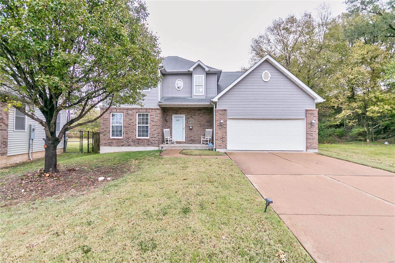 Welcome Home! This Beautiful 1.5 Story home has so much to offer! Main floor master bedroom suite with large walk-in closet. Open foyer, wood floors throughout, spacious family room with gas fireplace, main floor laundry room, eat in kitchen has center island with walk in pantry, walk out from the kitchen leading to backyard, balcony overlooks the family room, plus second junior suite with it's own  full bath  and two more spacious bedrooms! Hurry this beauty won't last long!!