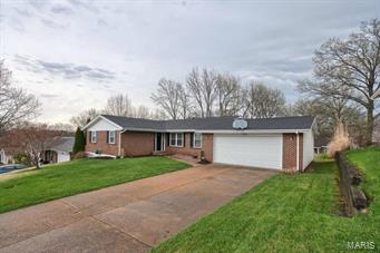 What a great find! This secluded & tranquil subdivision welcomes you! The front yard is practically big enough to host a baseball game (start training your Cardinals players early). The foyer invites you into this spacious, well-maintained & well-loved home. The main level boasts a living room & dining room for big family/friendly gatherings.  You’ll be impressed with the kitchen’s enormous amount of counter & cabinet space. All your gourmet gadgets will have their own little nook! Breakfast room has a beautiful view of the backyard & will be great for enjoying morning coffee or serving quick meals to kiddos before they take off for school. There are four bedrooms to round out the main level…children, guests…there's room for everyone! The basement is ideal for game nights, play area (chalkboard comes with the house:) As a bonus you’re close to La Bonne Bouchee (mmm pastries) or do your grocery & all kinds of other casual shopping at Heritage Place Plaza!