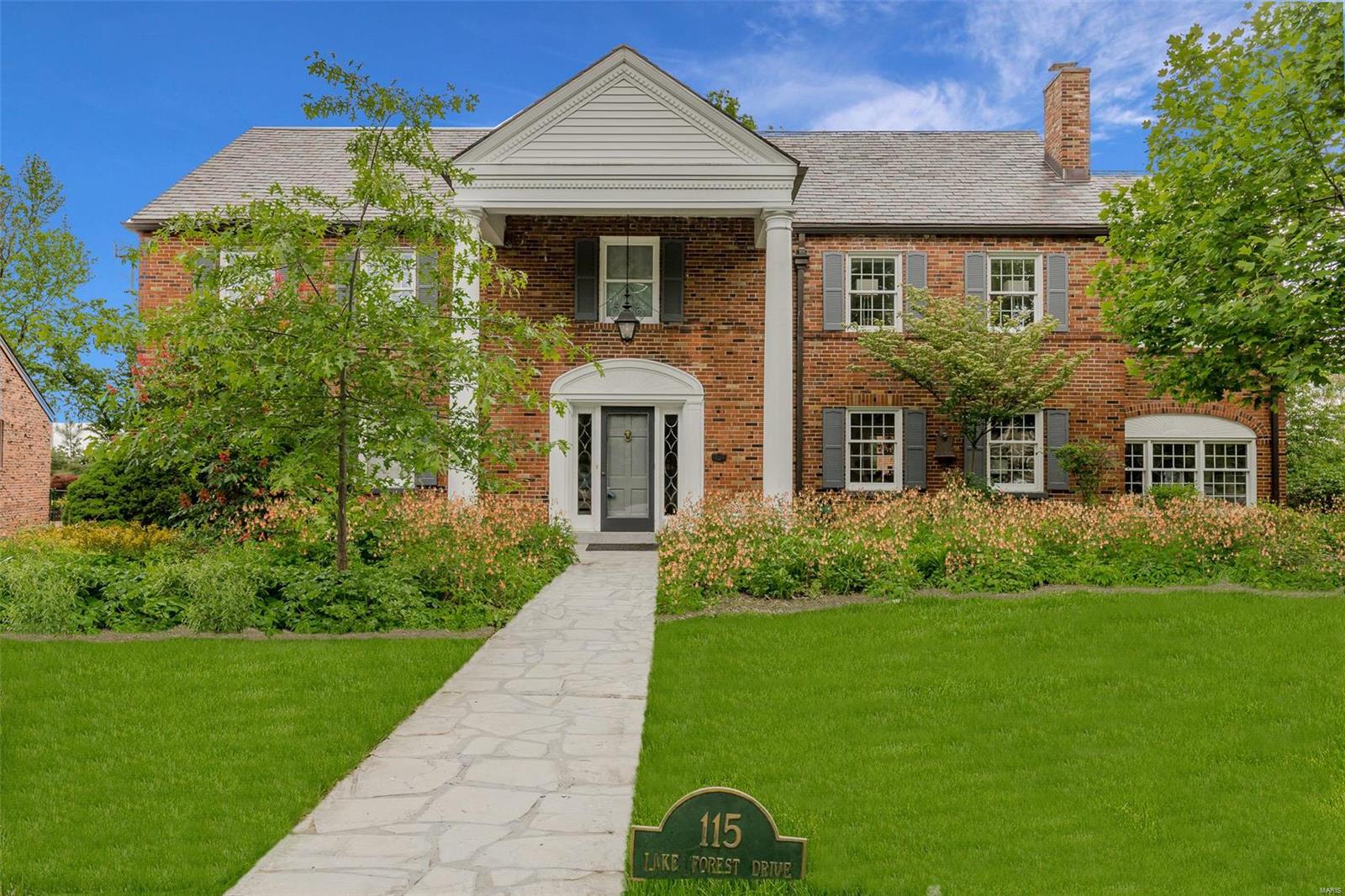 Back on Market - No Fault to Sellers -  Stunning Georgian Colonial on .49 acres in the prestigious Lake Forest Subdivision! 6Bd/5.5Bth & 5800+sqft of living spc w/LL.1st Flr boasts light & airy Living Rm, w/French doors & FP, formal DR w/stained wainscoting & crown molding; a wonderful Study/Den w/arched bookcases. Spectacular Great Rm w/tall ceilings, large bay, gorgeous custom FP & awesome wet bar! Gourmet Kit. w/custom cabinets, granite counters & backsplash; breakfast bar, bay window w/seat & SS appliances. Spiral stairs to 2nd Flr w/Master Ste, luxury Bth w/jetted tub, sep. shower & huge walk-in closet could also be Fitness Rm too! Also find 4 add’l Bds & 3 full Bths! 3rd Flr boasts legal 6th Bd, Media Rm or Play Rm. Highlights:hardwoods, newer HVAC, 2 newer water heaters, updated plumbing/electric & oversized rear-entry garage. Partially fin. LL w/Rec Rm, full Bth & plenty of storage! Relax outside on large patio & admire park-like yard. Clayton Schools!