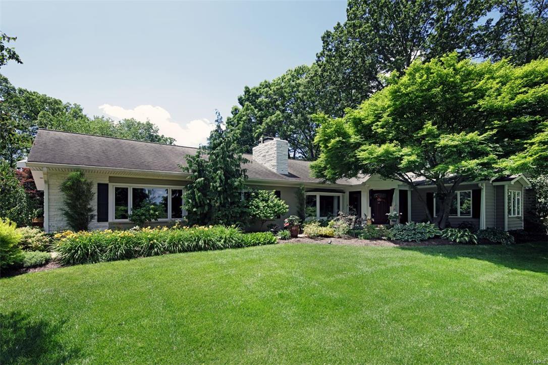 New Price. Renovated and architecturally exquisite Tuscan feeling home overlooking the Westwood CC golf course. Ladue Schools. This sprawling 4 bd, 5ba ranch is set on a lovely, professional landscaped, level lot w/gorgeous site lines. Rich colors and distinctive architectural touches throughout this classy home. The warm, inviting slate floors, designer fixtures, large windows, exquisite mill work, a mixture of granite, stone and other fashion-forward materials making this home incredibly special! Large gourmet kitchen w/granite counters, center island w/breakfast bar (seats 4), opens to a large vaulted hearth rm, w/decorative stone surround/fireplace and floor to ceiling windows. Custom octagonal breakfast rm encircled with glass, all overlooking the lusciously landscaped backyard, pool and hot tub. Private master ensuite retreat with spa like bath area. Great finished lower level w/rec space, full bath, dry bar and an extra sleeping area. Oversized 3 car garage. AHS warranty. Additional Rooms: Mud Room
