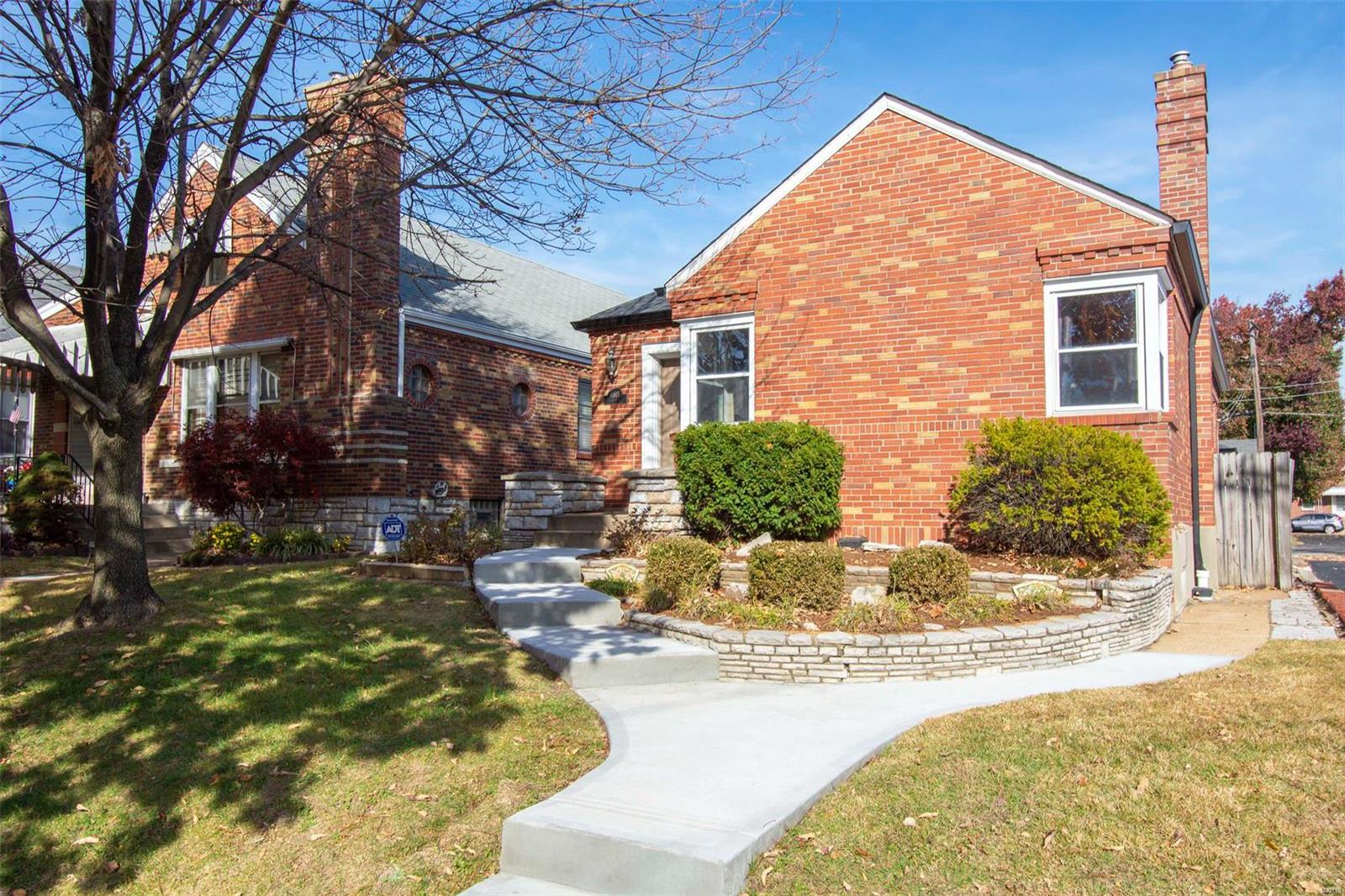Est. 1939: Spectacular bungalow near Lindenwood Park with two bedrooms and two full bathrooms. Enjoy strolling up the newer front sidewalk to the entry that leads to a wonderful living room with an original art deco marble decorative fireplace. The corner windows add to the charm of the home. A nice sized dining room is perfect  for entertaining. Cottage style kitchen leads to the covered back porch with plenty of space for relaxing. In the finished basement there is a large living space as well as storage, and a bonus space for an office. Another full bathroom completes the lower level. This home has a one car garage and carport type space for off-street parking. Tons of great restaurants and shopping are walkable and make the location unbeatable!