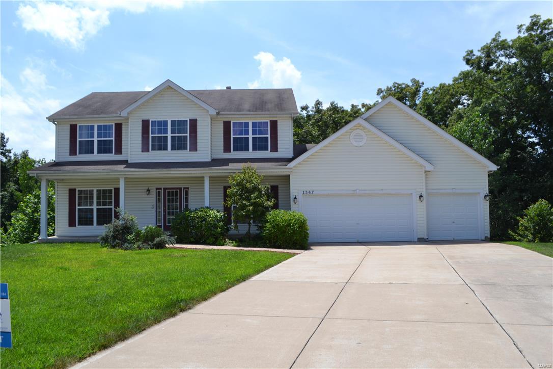 Very spacious 4 bedroom, 2.5 bath 2-story home is Wentzville on a quiet cul-de-sac. Home features 3 car garage, see through fireplace, hardwoods in living room, large master bath and plenty of storage in the basement. Don't miss out!