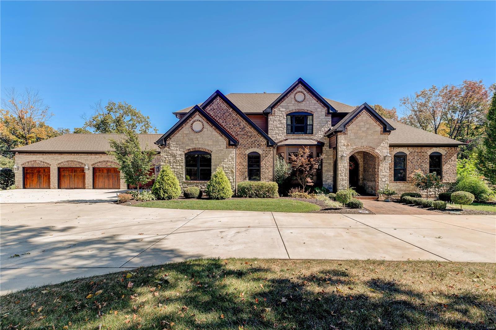 Turnkey and move-in ready; built in 2016, this stunning home is one of a kind. With resort style grounds and interior to match, this home is sure to please the pickiest of buyer. Nestled on 3+ (usable) acres, gated grounds, and circled drive, home offers updates galore as well as spacious areas for those who love to entertain. 7000+ sq. ft of living space that includes 5 bedrooms, 4.5 baths and 6 car garage. Additional highlights include large gourmet kitchen with double slab island that seats up to 10, picturesque view from hearth room, separate dining, cozy living room with fireplace that leads out to covered veranda with media center. This open concept floor plan allows for easy flow with defined living area and finished w/o LL. The main feature of this house is the backyard oasis, featuring a large saltwater pool, hot tub, covered bar area, grill, gas cooktop, storage, & TV’s plus heated, cooled and running water in mini barn for goats, pigs or chickens. This home has it all! Additional Rooms: Mud Room