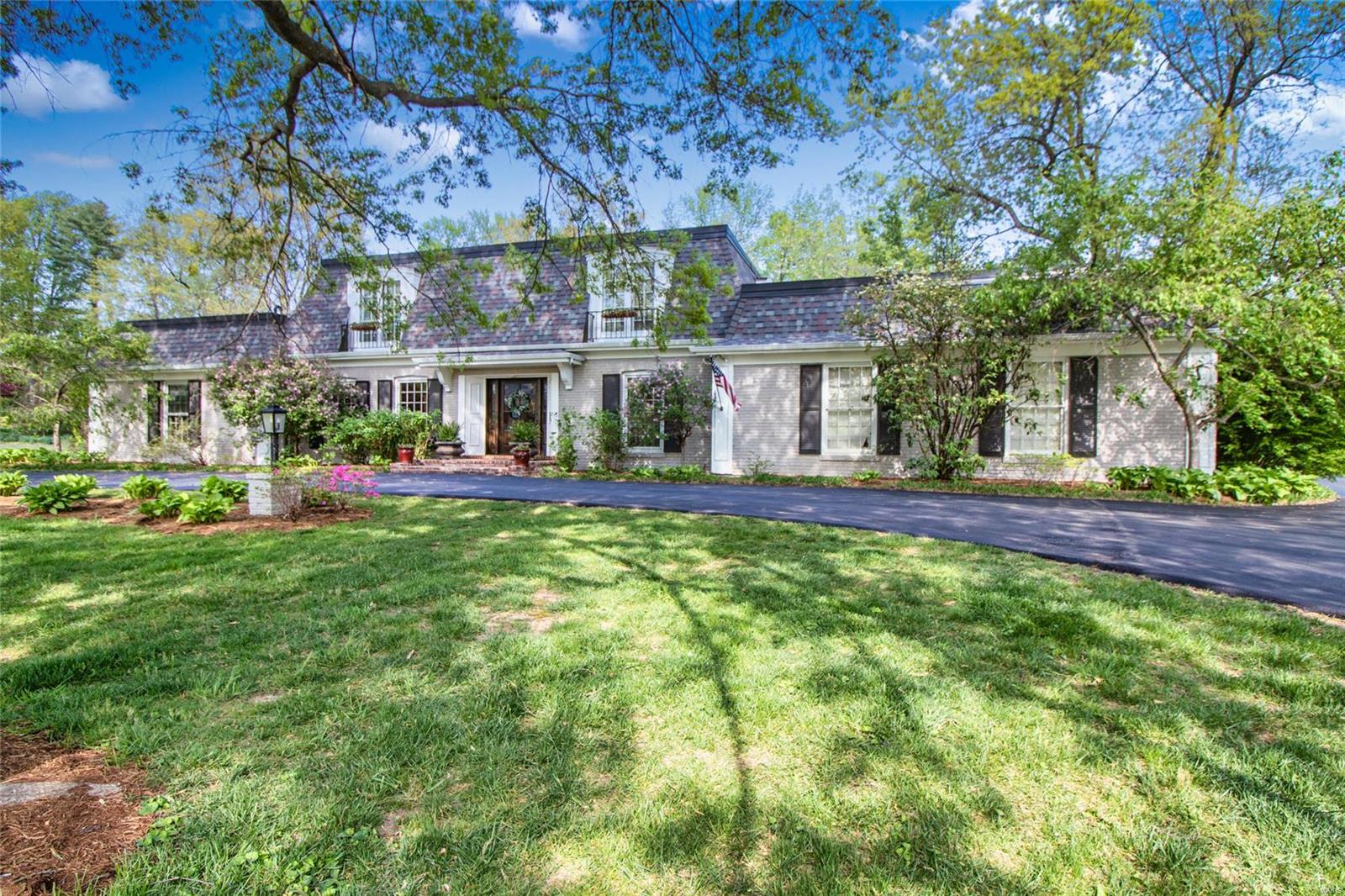Classic Higginbotham built home in Frontenac /Ladue School District. Beautiful 1 acre level lot backs to trees. New Asphalt drive and custom front door 4/23. 2 story entry foyer. 6 bdrm 4 1/2 baths. All bathrooms, utility & kitchen have granite countertops. All main floor rooms flow comfortably into one another. Abundance of natural light, millwork throughout, hardwood floors main level (except  primary bdr suite). Hearthroom with gas fireplace & built in cabinetry. Dining room currently used as a children's playroom, formerly home office. Fabulous utility/mud room Washer/Dryer stay. Upstairs 4 bedrooms/ new carpet 4/23, 2 Jack & Jill bathrooms. Tastefully finished downstairs with family room, 6th bedroom with egress window, closet, full bath. Plenty of storage & built in shelving. Dual water heaters '15 Newer Zoned HVAC '18, Newer roof (7yrs) Sprinkler System, Invisible dog fence. 

Location, Size & Value This one could be your Forever Home!