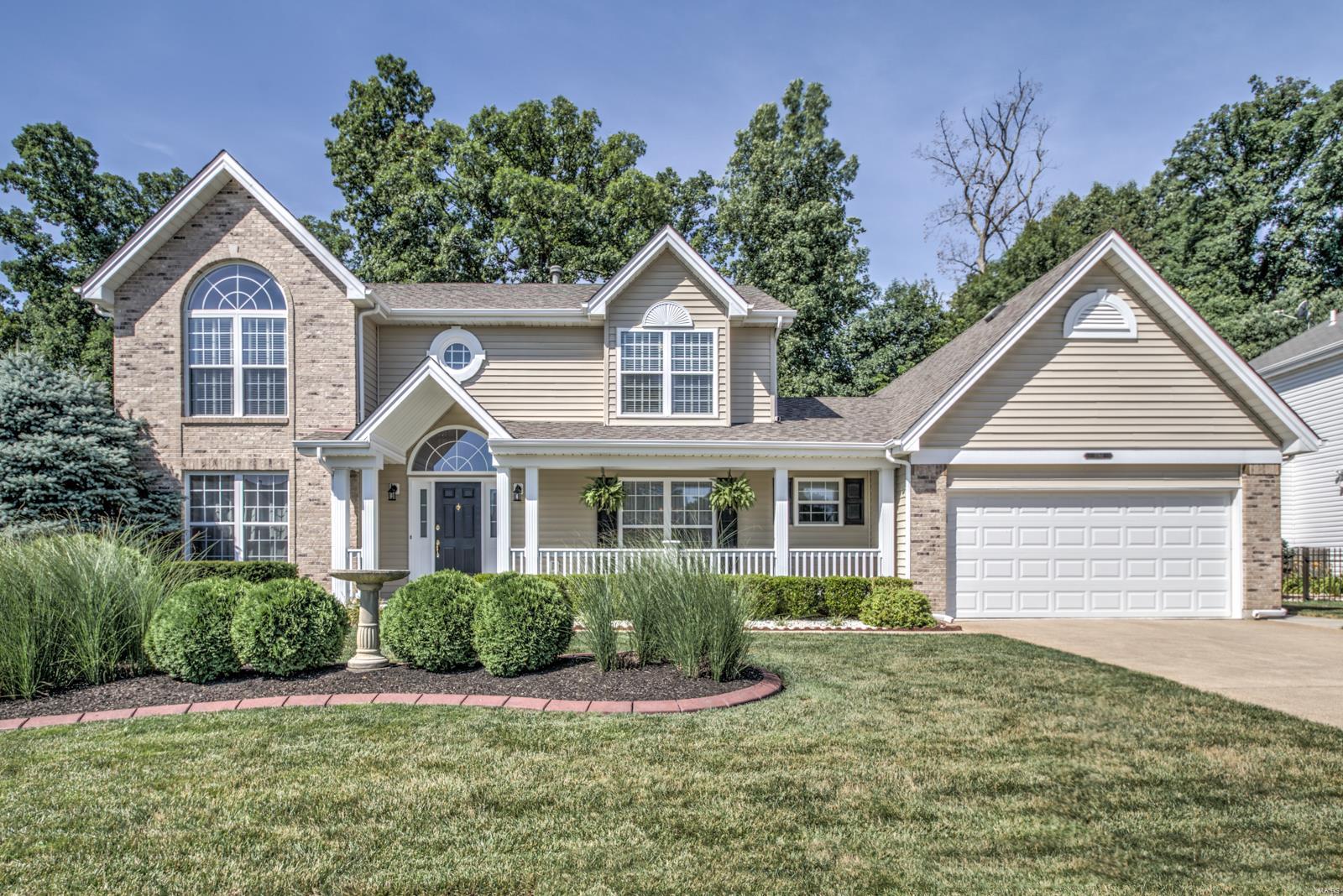 One word describes this home: WOW! A large kitchen/breakfast room features new stainless appliances, new gas range, a large center island with lots and cabinet space and breakfast bar, hardwood flooring, custom cabinets, 2 pantries, and planning desk. Spacious family room features a beautiful fireplace w/brick surround, TV niche and built-in plus a large bay window. Main floor also has a laundry with deluxe utility sink, separate dining room, office/study, powder room and 2 story foyer. Master bedroom with vaulted ceiling, large arched window, a huge walk-in closet and ensuite featuring an oversized oval tub, dual vanity, and separate shower. Three other bedrooms are generous in size.  Massive attached garage (enough for 4 cars / boat) and a nice private backyard with huge entertaining patio, fire pit, and backs to a wooded area. New carpets. Upgraded light fixtures and fresh interior paint. Zoned HVAC and humidifier. New downstairs A/C in 2017.