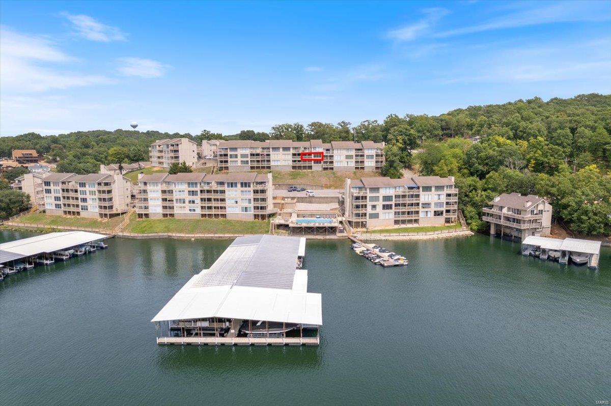Stylish 2-bedroom 2 bath condo available in the heart of Osage Beach, MO at Indian Pointe Condominiums at Mile Marker 17! This condo has been completely remodeled and many features include: New LVP, Fully Remodeled Kitchen (Granite Countertops, Kitchen Soft-Close Cabinets, Stainless Steel LG Appliances, Kitchen Sink & Faucet), Fully Remodeled Bathrooms, TURN-KEY, SHORT-TERM RENTALS ALLOWED, Plenty of Overflow Parking, Washer & Dryer Stay, Stylish Paint Scheme, Walk-in Closet, 2 Storage Boxes, Large 14x36 slip and so much more! Indian Pointe has 3 pools with 2 heated, tennis courts & clubhouse. This is a Great Vacation Get Away or Great Investment Rental. This condo is only 6 steps to the door and centrally located by land & water. By Land: Close to grocery stores, shopping and medical. By Water: Just a short boat ride to restaurants & entertainment such as Backwater Jacks, Dog Days, Shorty Pants, Redhead, & Margaritaville. Come See It Today and Start Enjoying The LAKE LIFE!