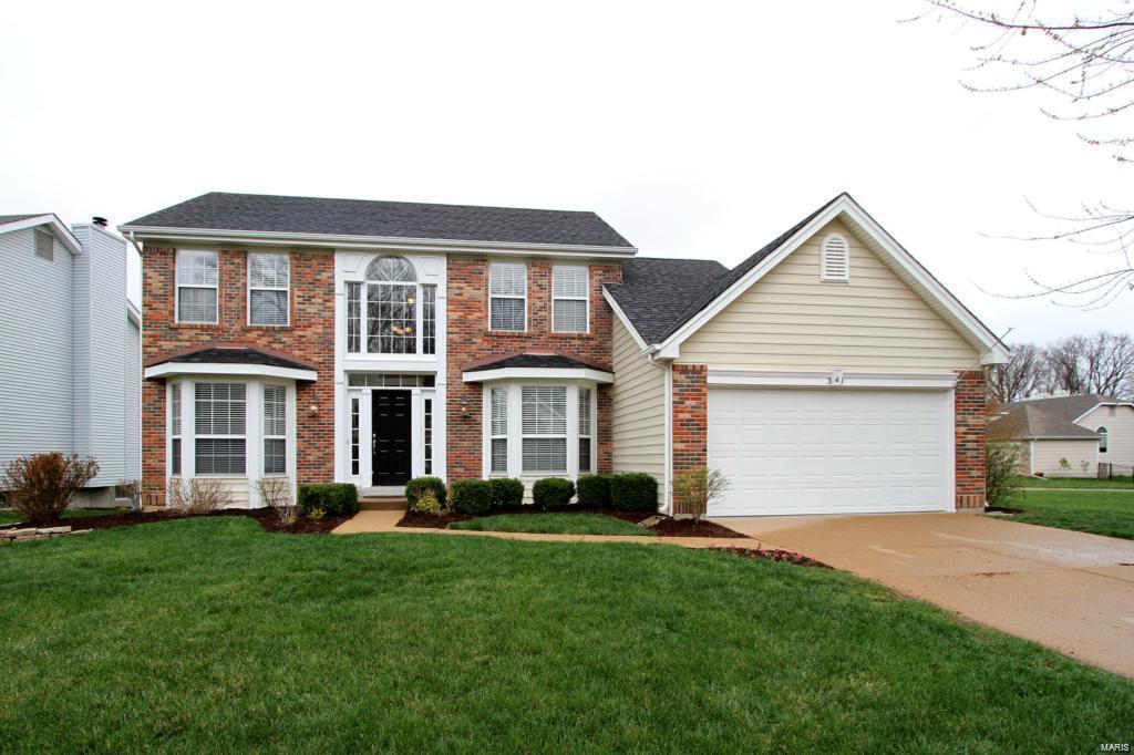 Move-in ready! Great kitchen, updated cabinets w/crown, glass tile backsplash, granite countertops, center island & SS appliances. The spacious breakfast room leads to a lovely patio, level yard with a black aluminum fence. Engineered wood floors throughout the main level in 2020, new lighting throughout the main level 2020, New furnace in 2021. Most of the stainless steel kitchen appliances were replaced in 2021. Spacious dining rm w/bay window, crown molding, chair rail & picture frame molding. Large Family Rm has window bay, wood-burning fireplace & wet bar. The lower level has a deep pour, recessed lights, new flooring 2020,  large family/ Rec room, Plus den/ sleeping room, or great 2nd home office. Master Suite has vaulted ceiling, walk-in closet, his/her sinks, ceramic tile flooring, separate shower & soaking tub. Subdivision pool!