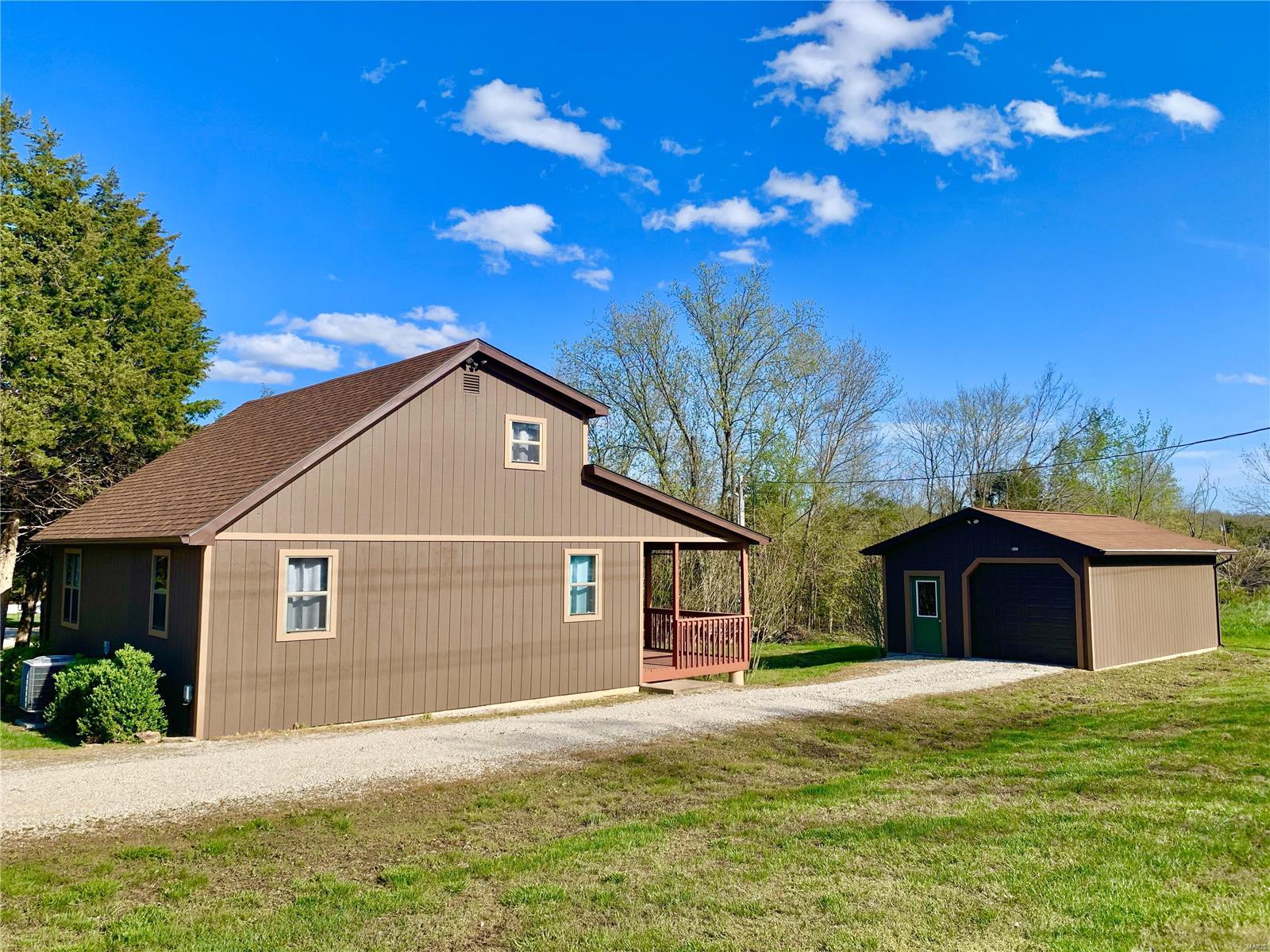 This property is a 3 bedroom 2 full bathroom home at Mark Twain Lake just a few minutes from Blackjack Marina sitting on just over half an acre with a detached, insulated 20x30 garage and oversized covered porch.  The home has been a successful vacation rental on Airbnb and VRBO for the past two years and comes fully furnished with EVERYTHING you need to begin enjoying or to rent out yourself!

Fiber internet and smart tvs in every room, several updates in the past two years - new roof, flooring, kitchen, laundry, paint in 2021.  Rental history summary available to serious buyers only.  Agent owned property.