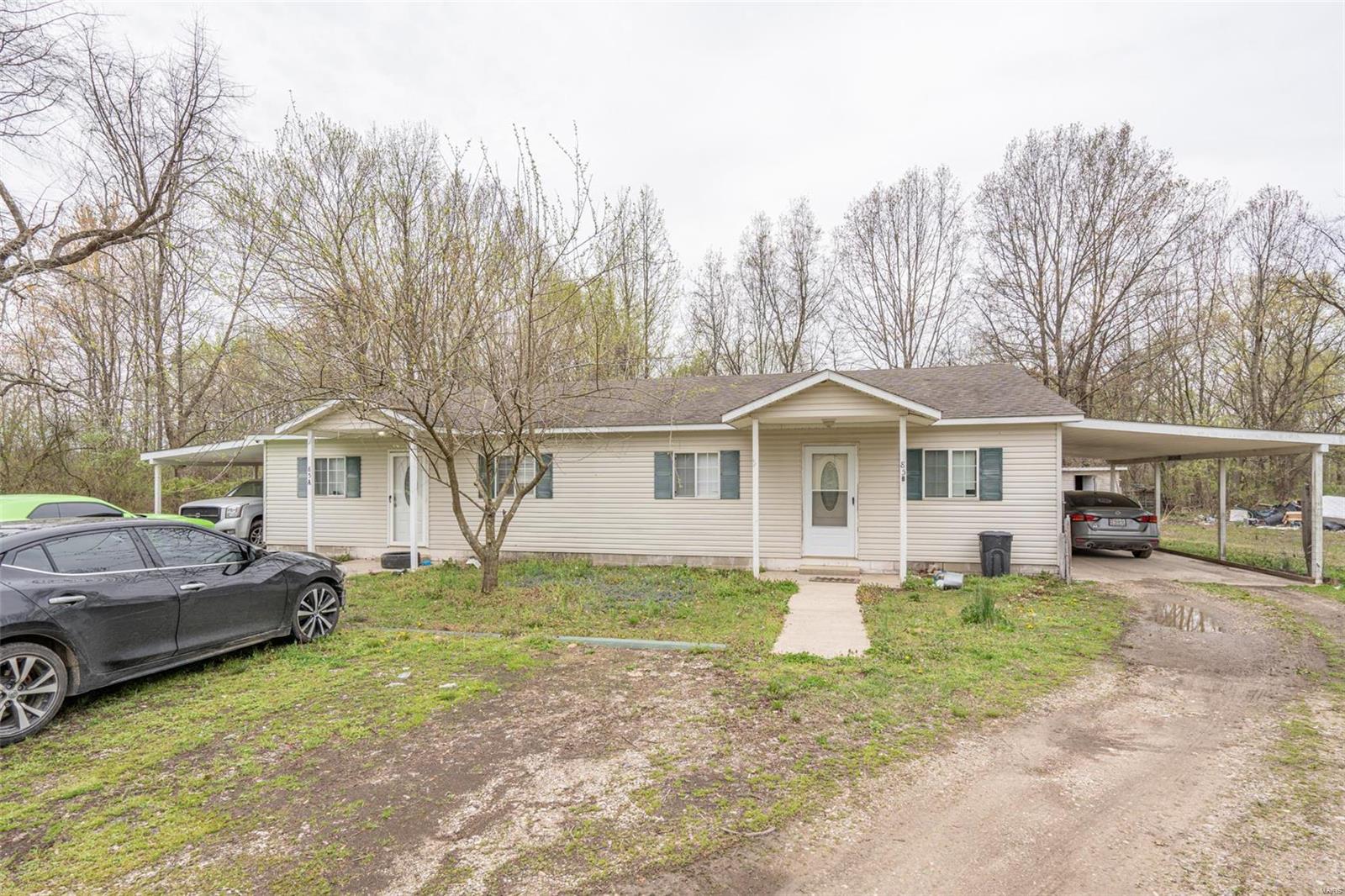 $179,900.00 85 CR 605 Poplar Bluff, MO 63901 Multi-family property which includes one duplex and one stand alone house.  Each duplex contains 810 SF, 2BR 1BA and 1 car carport.  The stand alone house is a 3BR 1BA home, and these sit on approximately 1.17 acres and NOT in a flood zone!  All electric and fully occupied.