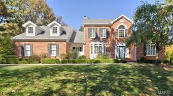 Be home for the holidays in this splendid Ladue home, 18 years young and ready for your large gatherings. Cathedral entry with grand staircase & chandelier has Palladian clearstory window, sunken living room with coffered ceiling, wet bar & fplc, formal dining, and private study, all on main floor. Kitchen is spacious and bright with 42" cabinets, generous island w/cooktop, built-in fridge, pantry. Breakfast room has wall of windows overlooking large, private yard w/ trees. French doors lead to den retreat. Main floor master suite has 10 ft tray ceiling, luxurious bath with jetted tub, sep shower, commode room, and huge closet. 3 upstairs beds w/ 2 full baths. Custom details throughout-Plantation shutters, premium moldings/trims, wood insulated windows, and built-in bookcases. Extra features include: Beam vac, inground sprinklers, security system, zoned HVAC, gutter covers, & deep pour lower level. This well maintained home is tucked away on a private lane yet near to all that matters. Additional Rooms: Mud Room