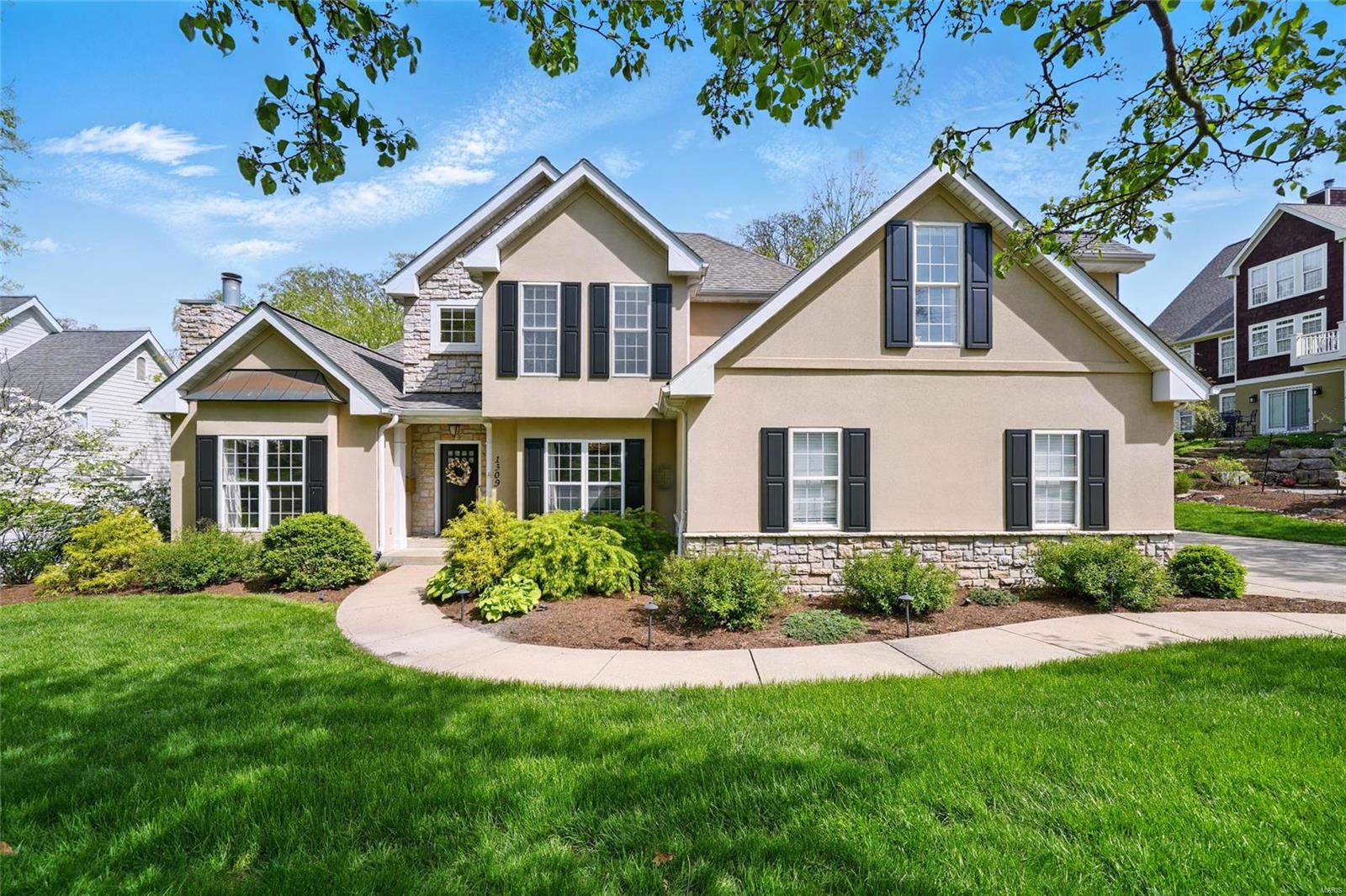 Experience over 4,800 sq. ft. of luxurious living space in one of Kirkwood’s most desirable locations!This light-filled 1.5-story home is packed with high-end details: a chef’s kitchen with Wolf range and Sub-Zero fridge,a main-floor primary suite with spa bath and transom window,and rich hardwoods throughout.Upstairs offers 3 bedrooms,2 full baths,built-ins,and a bonus room.The finished walk-out lower level has a 5th bedroom,full bath, temperature-controlled wine cellar with smart lighting,and a stunning family room/rec area with custom bar and patio access.Step out to a large, maintenance-free deck off the kitchen that overlooks the professionally landscaped and lit backyard with a pergola area and an 80-jet hot tub (negotiable).A smart home system adds modern convenience.Oversized 2-car garage,laundry chute,and elegant millwork throughout elevate everyday living.Every detail of this home is designed for comfort,convenience,and lasting value! Additional Rooms: Mud Room, Wine Cellar