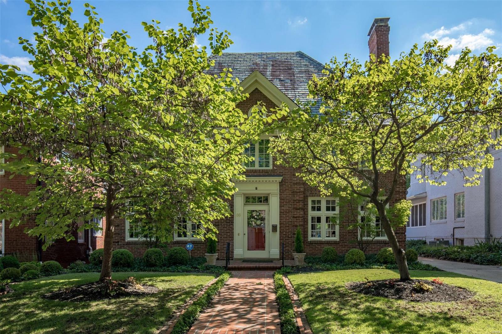 The ultimate in charm and relaxed living. The home entrances you with an incredible circular floor plan. Designer decorated with equal measures of casual and elegant styling. Living room opens directly to family room with fireplace and access to patio area. Dining room opens directly to kitchen/gathering room. The kitchen/gathering room is like no other and sure to be the epicenter for family/friends to celebrate life. This entertainer's dream overlooks the courtyard style patio and rear gardens! One of the rare Hillcrest homes that backs to and overlooks lush Concordia Park! Master bedroom runs full front to back of home and hosts updated bath and dressing area. All baths are updated and all the bedrooms are filled with natural light. The third floor is an ideal guest or teen getaway. Lower level is the perfect yoga/play getaway. 2 car detached garage. A quick stroll to Captain Elementary or Wydown Middle School, Forest Park, Washington U. and DeMun village-entertainment district.