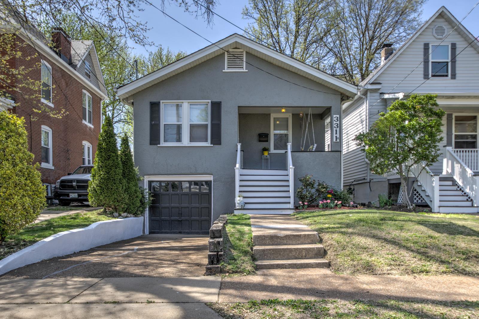 PRICE REDUCED!!! CHARMING STUCCO BUNGALOW within WALKING DISTANCE of DOWNTOWN MAPLEWOOD! Home features 3 bedrooms, one is a walk-through currently being used as an office, updated bathroom, large living/dining room combo with fireplace, and updated kitchen with granite, stainless steel appliances, and subway tile backsplash. Updates include newer windows, hardwood flooring, and fresh paint. Newer systems and roof(approximately 8 years). MAIN FLOOR LAUNDRY! Adorable front porch with swing. Newly refinished deck off kitchen and fenced backyard. Basement tuck-under garage. CLEAN basement with plenty of storage room. WALK TO RESTAURANTS, BARS, SHOPS, AND ALL THAT DOWNTOWN MAPLEWOOD HAS TO OFFER!