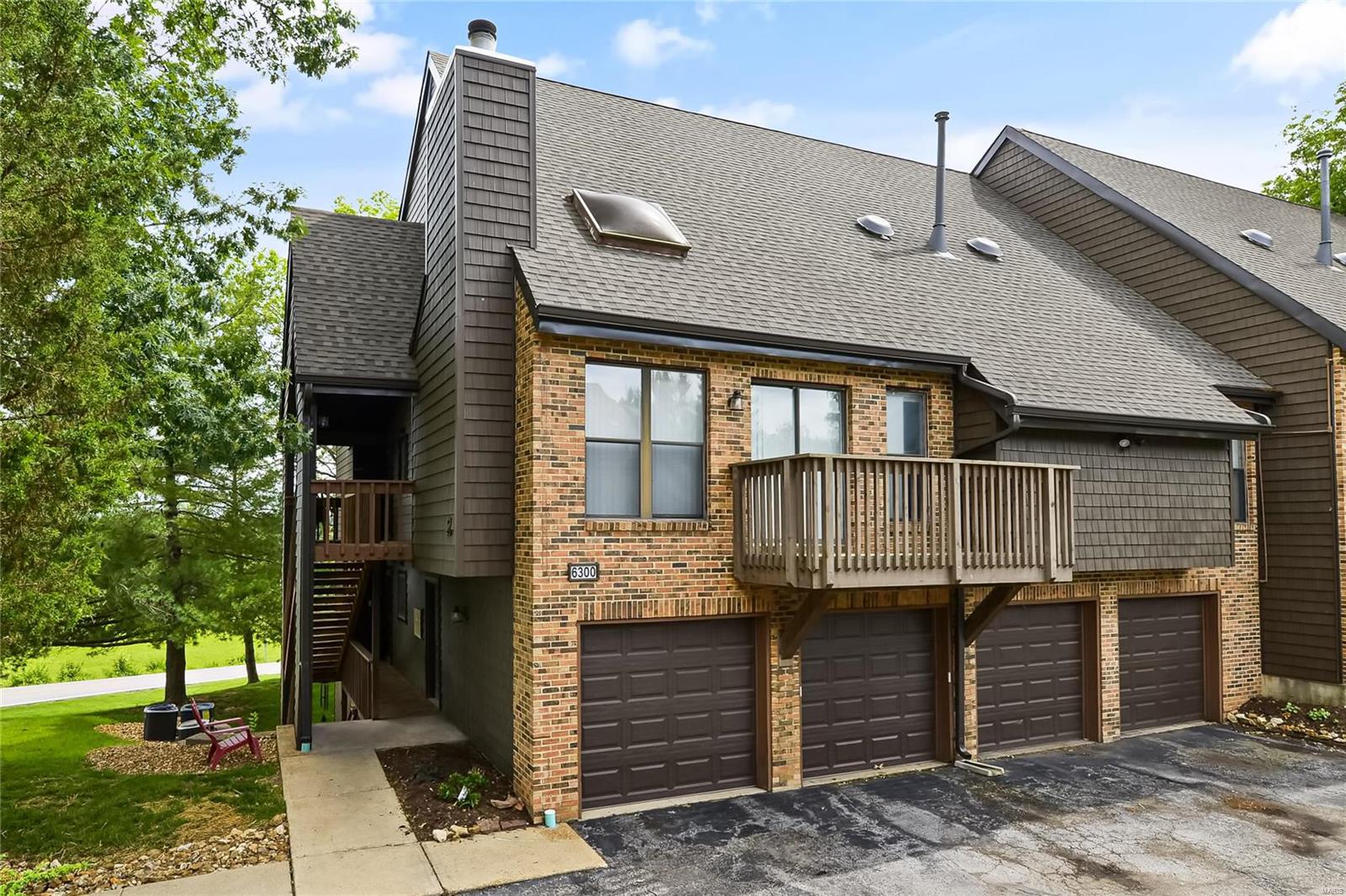 Welcome to 6300 Sprig Oak #C.  This 2 bedroom, 2 bath condo is a 2 level unit up a single flight of stairs. Spacious living room w/ newer laminate flooring, vaulted ceilings & a skylight & gas fireplace. Access your newly refinished deck that overlooks a wooded area. All kitchen appliances included in sale. The master suite includes a walk-in closet, secondary closet & a master bath featuring a double bowl vanity & separate tub and shower. If you need the best closet ever, the second bedroom w/ massive closet & huge loft area is on the 2nd level. Loft area also has a wet bar/mini kitchen.  Private in-unit laundry & updated 2nd bath on main level. Newer laminate plank flooring & HVAC system, custom closets on all levels--all freshly painted too!  Keep your vehicle out of the elements in the assigned, 1 car garage that also is home to a storage closet. Genesee Park is conveniently located across the street from the Kennedy Recreation Center, Susan Park and Quail Creek golf course. Location: End Unit