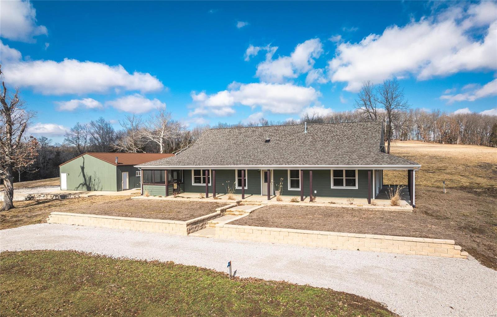 This beautiful newly remodeled 3 bed, 2 full bath home sits on spacious acreage and offers the perfect blend of comfort and functionality. The home features a charming wrap-around porch, providing the perfect spot to take in the serene views of the surrounding countryside. The property has gorgeous pasture fields, ideal for livestock or recreational use, and is well-equipped with multiple sheds and pole barns for all your farming or storage needs. An outdoor horse rink adds to the appeal for horse enthusiasts, while several ponds, including one stocked with fish, gives you the perfect place to spend time with family and friends. Whether you’re looking to raise cattle or horses, or simply enjoy rural living, this property offers a quiet, secluded area where you can enjoy the best of country life.