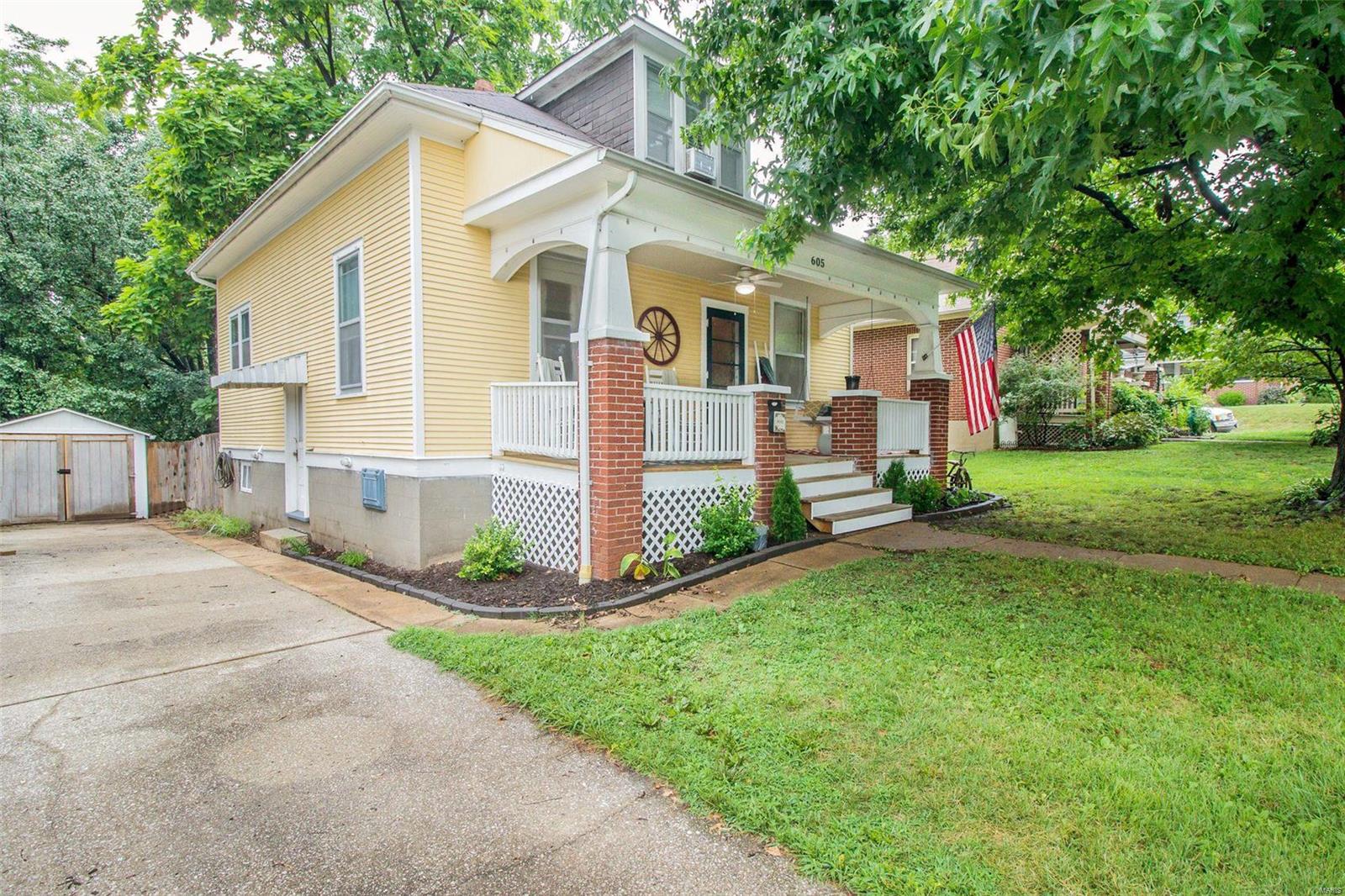 So many updates in this great home.  Wonderful neighborhood with mature trees and walkable to downtown, the sellers of this home have made many updates including new flooring and a master suite renovation upstairs.  Large fenced in backyard and detached workshop lend for plenty of outdoor entertainment space.  Welcoming front porch, formal dining, and updated kitchen all add to the appeal of this home.  Upstairs you will find a large master suite with walk-in closet, additional bedroom / nursery and full bath.  Huge, fenced backyard with mature trees for shade!  Great neighborhood!