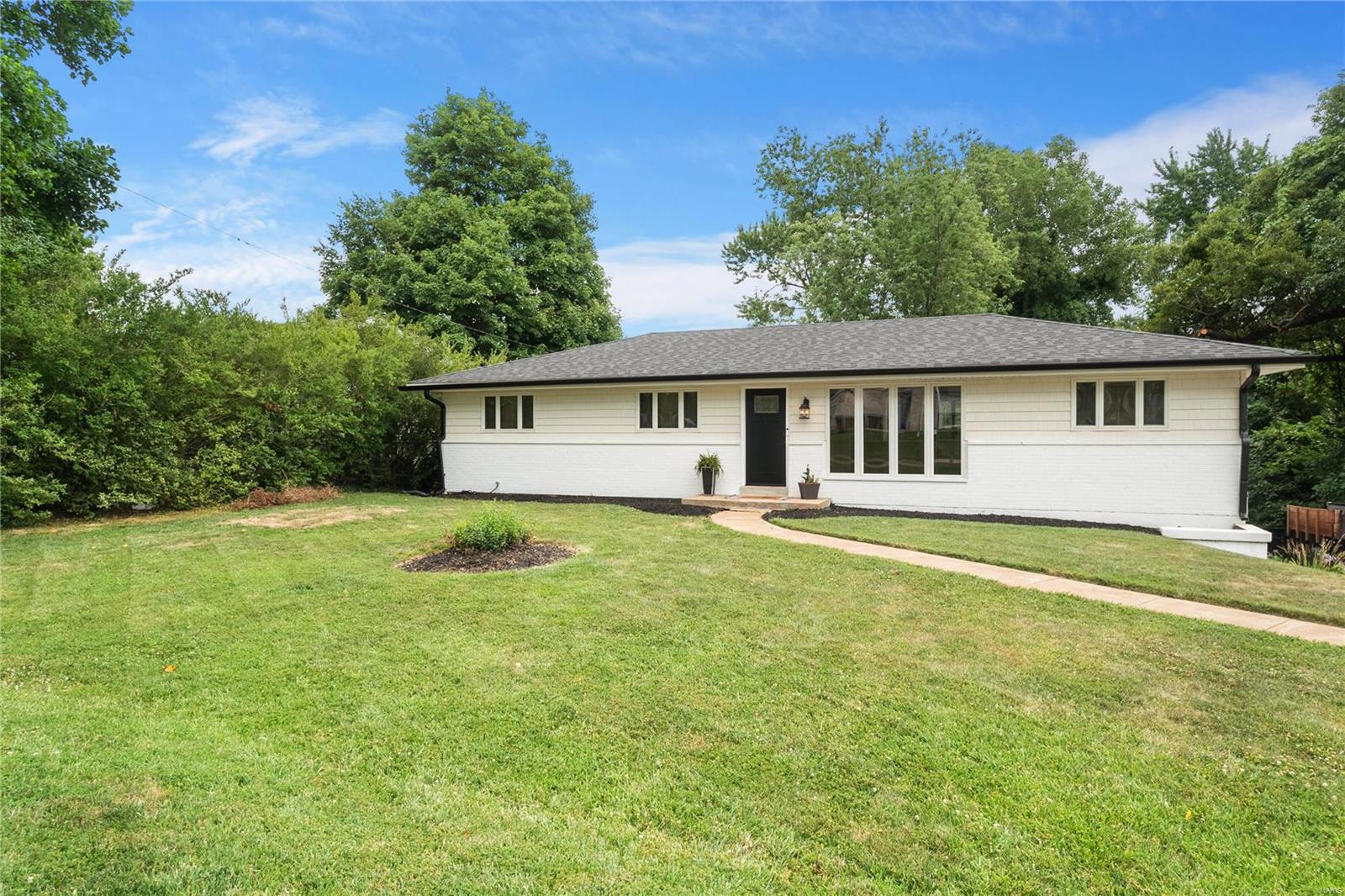 3 Bed 2.5 Bath NEWER ROOF guttering and siding(2 years old), gleaming new floors, spacious open floor plan, master bath, tons of natural light, LL living space, 2-car garage, HUGE fenced yard w/outdoor entertaining area; this one has it all! Ranch home on oversized lot in Pattonville School District close to Bridgeway Park, easy access to shopping/dining. Living room & Kitchen feature new lighting & large windows for natural light. Recently remodeled kitchen with new back splash, counters, ample storage, large pantry, under-mount sink, gas range, and exits to the large deck built for entertaining. Kitchen flows into the Family Room for open entertaining space. Master bedroom offers double closets and ensuite bath. Lower level walks out to a covered patio, entry from the two car garage.  Large bonus/ rec area as well as full bath and office or additional sleeping area.  This home is move in ready and comes complete with fresh and current style!