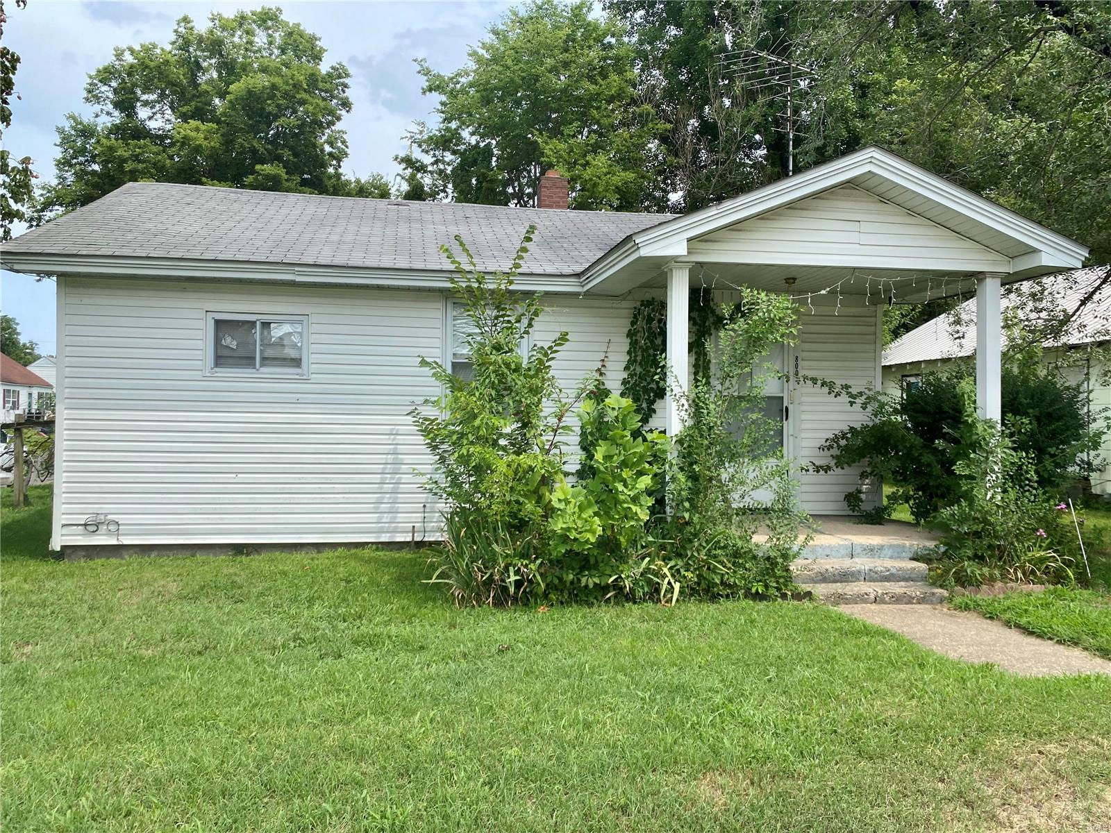 Investment opportunity at a great price!  This 3 bedroom, 1 1/2 bath is currently tenant occupied.  It is much larger than it looks and includes a living room, dining room, and kitchen.  It also has a good sized laundry room with plenty of storage space, and a mudroom just inside the carport door that would make a great office space. An additional 13x18 storage room is also located in the two car carport.  A new HVAC unit was just installed recently, making utility costs low!