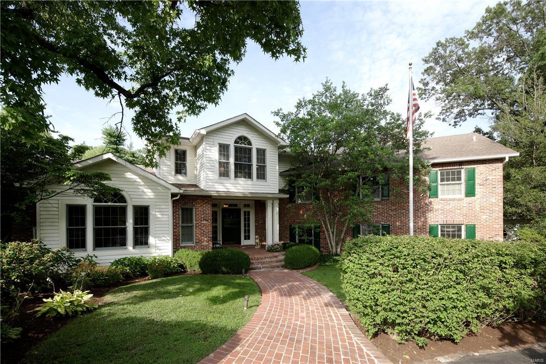 *New Price*Correct address is 00 Fordyce Lane*Beautiful original home (66 yrs old) with a seamlessly blended addition (22 yrs old), approximately 7,550sqft of total living area, situated on 1.8 acres, offering 5 bedrooms + apartment located in Ladue - a must see! Upon entering the light filled entry, the expansive home opens to a paneled study, step down formal living room & dining room, each with fireplace, heart of the home family room with significant floor to ceiling stone fireplace, adjacent to chef's kitchen & breakfast area. Master bedroom suite with sun/sitting room, multiple closets, luxurious master bath, laundry room & 2 half baths complete main level. Second floor offers 4 additional bedrooms, 3 full baths. Finished walk-out LL with unique custom finishes, full bath, wine cellar, abundant storage. Attached apartment with kitchen, bedroom, full bath, laundry. Spectacular resort-like setting with saltwater pool, spacious gazebo, & wrap around deck. Two separate 2 car garages.