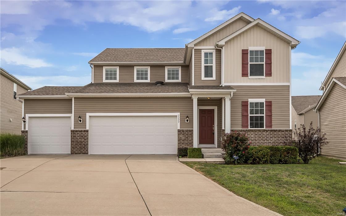 Ready for move-in! Stunning newer home ideally situated within Ohmes Farm subdivision in St Peters! Incredible curb appeal highlighted by the beautiful construction, stone veneer and landscaping. Inviting entry foyer welcomes you inside the main level offering 9ft ceiling & gorgeous hardwood floors! Enjoy the luxurious eat-in-kitchen which boasts granite countertops, stainless steel appliances, tile backsplash, custom 42" maple cabinetry and breakfast area w/walk-out to stamped patio & large level backyard! Enormous great room features tons of natural light. Formal living & dining rooms as well! Locate the spacious master suite through the upper level loft space & laundry. Master includes coffered ceilings, walk-in closet and incredible master bath w/dual sinks, separate shower and soaking tub. Large bedrooms! 3-car garage! Available for lease purchase or lease option. PETS negotiable. View today!